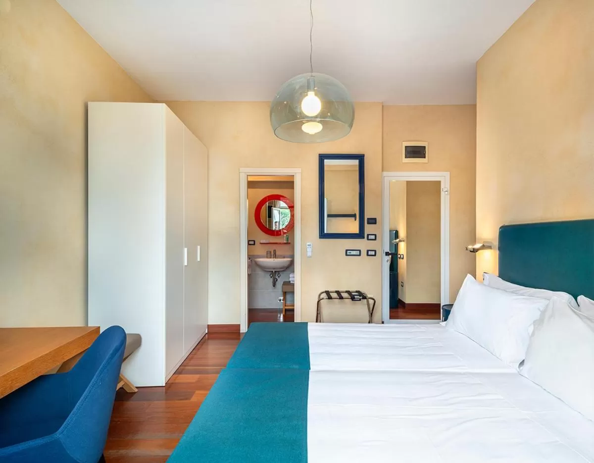 Bed in Rosabianca Boutique Hotel