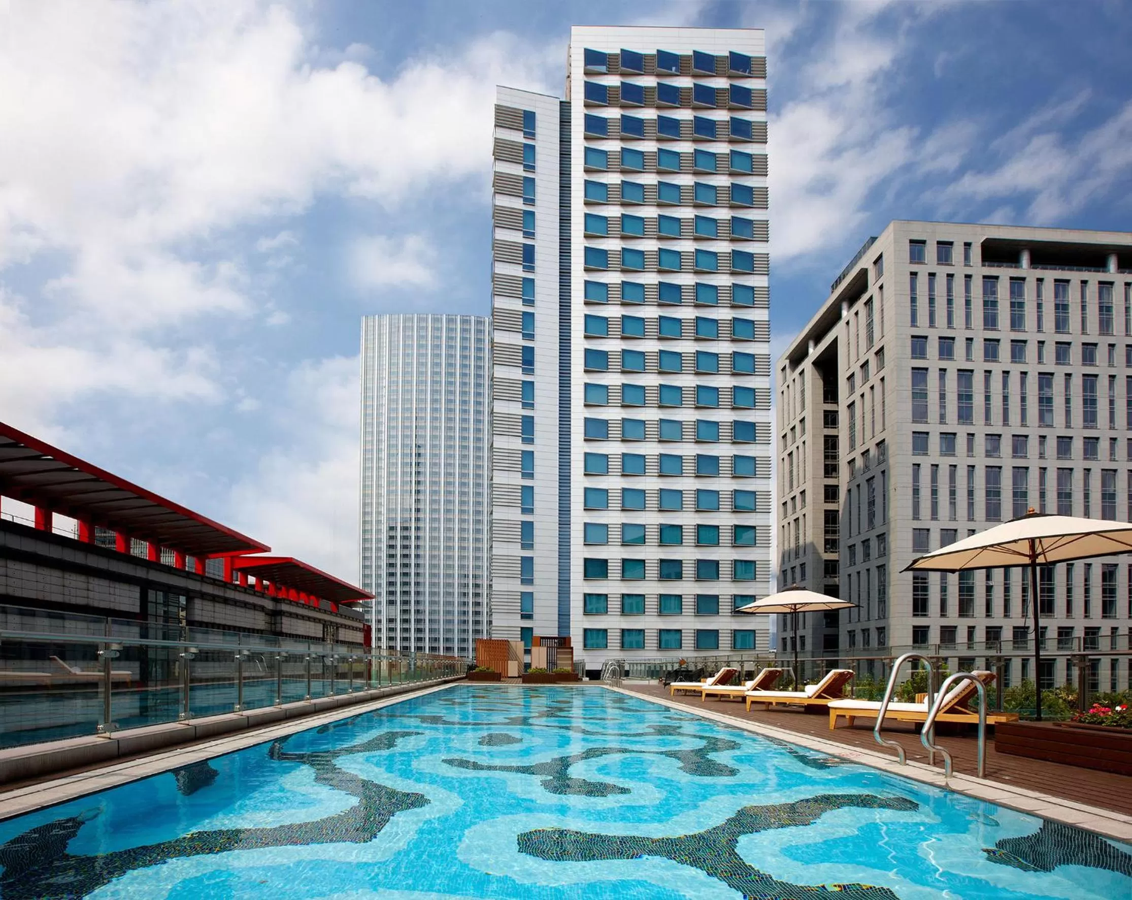 Swimming pool in Humble House Taipei, Curio Collection by Hilton