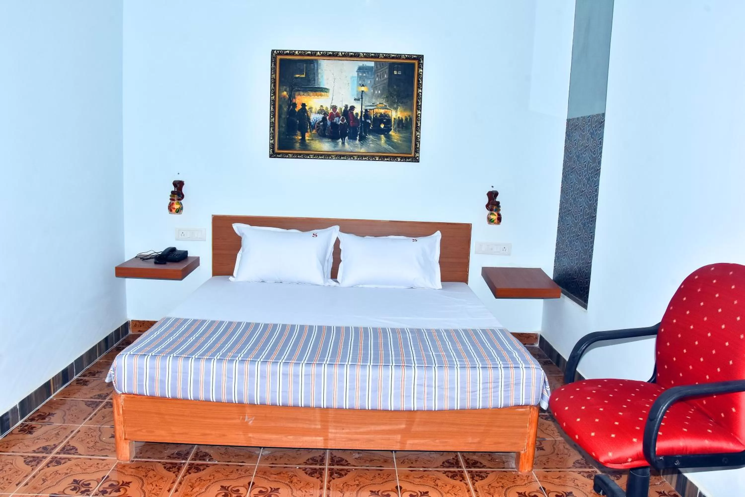 Bed in Sangam Inn & Banquets