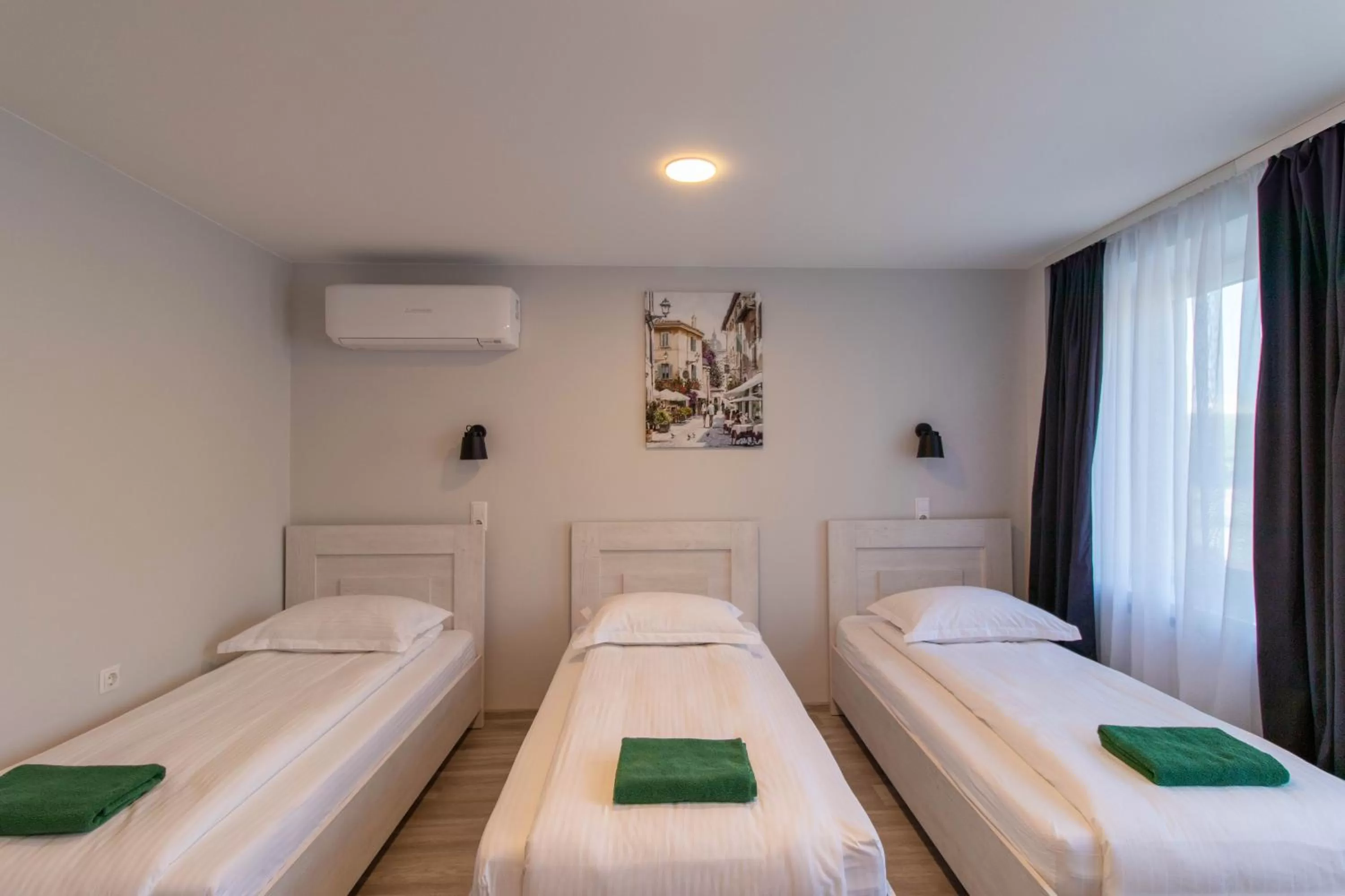 Bed in Dzukija Hotel