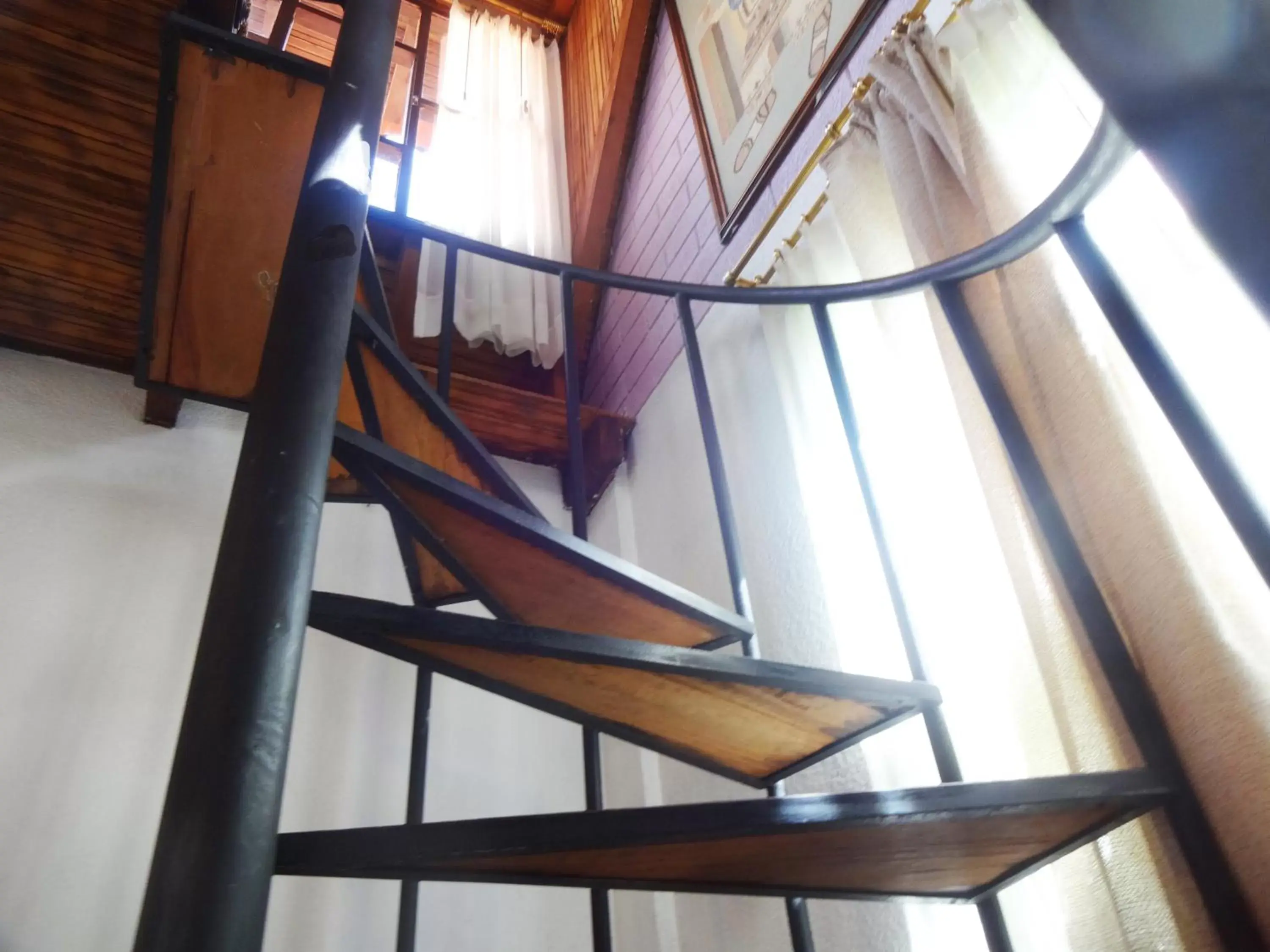 Family Room with Balcony in Hosteria Casa Giralda Family Room with Balcony in Hosteria Casa Giralda