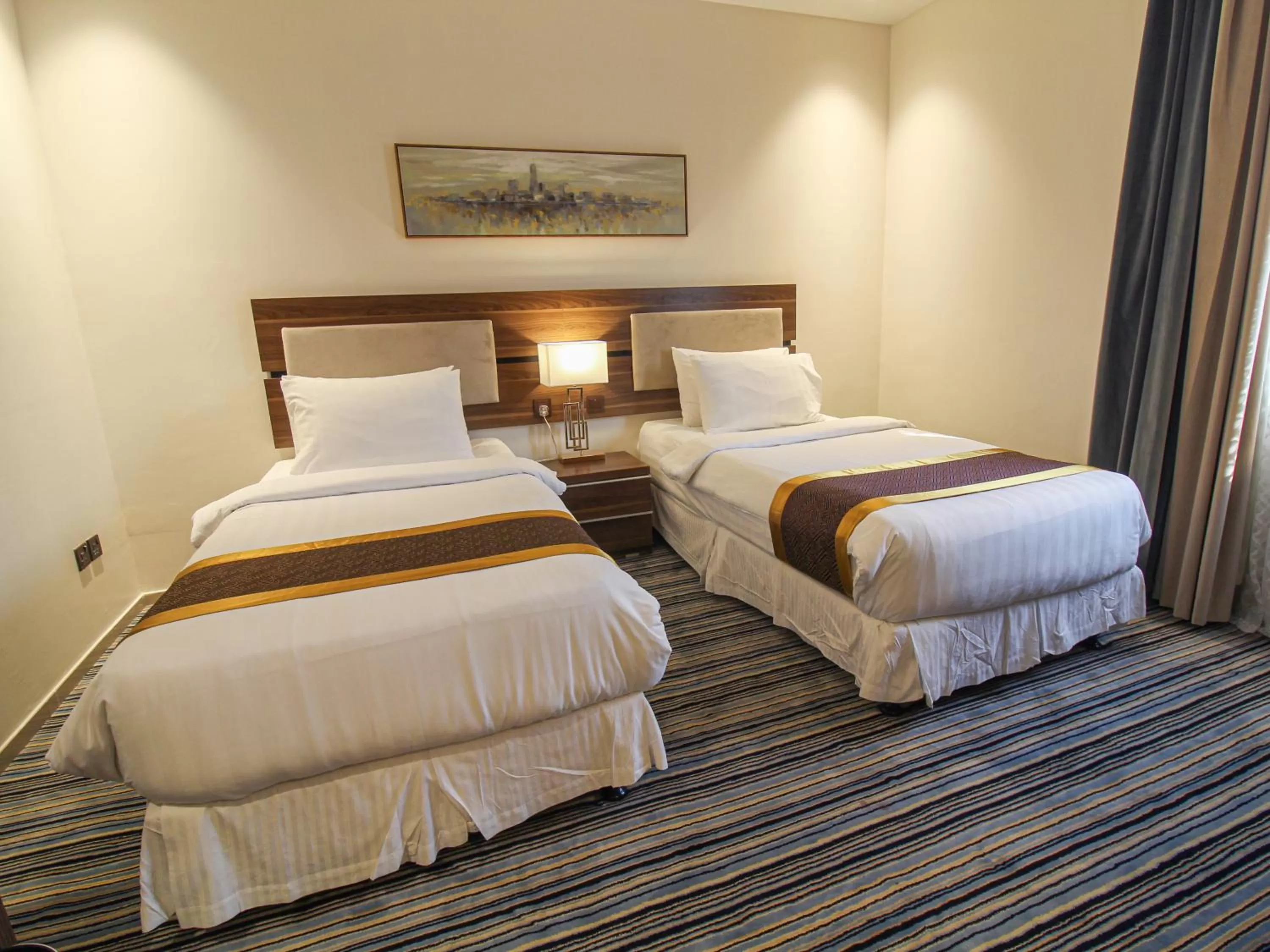 Bed in Friesian Hotel Suites