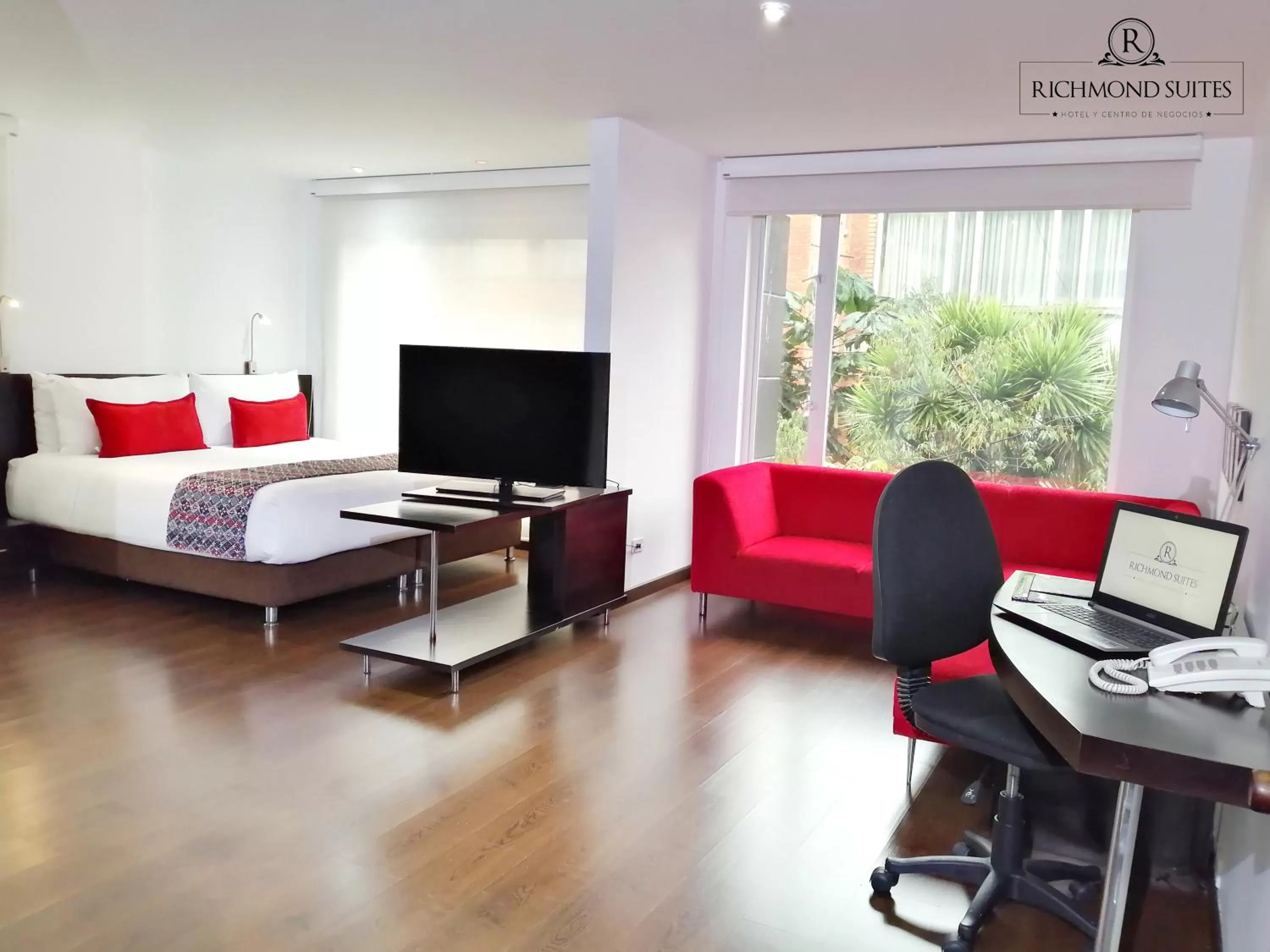 Photo of the whole room, Bed in Richmond Suites Hotel