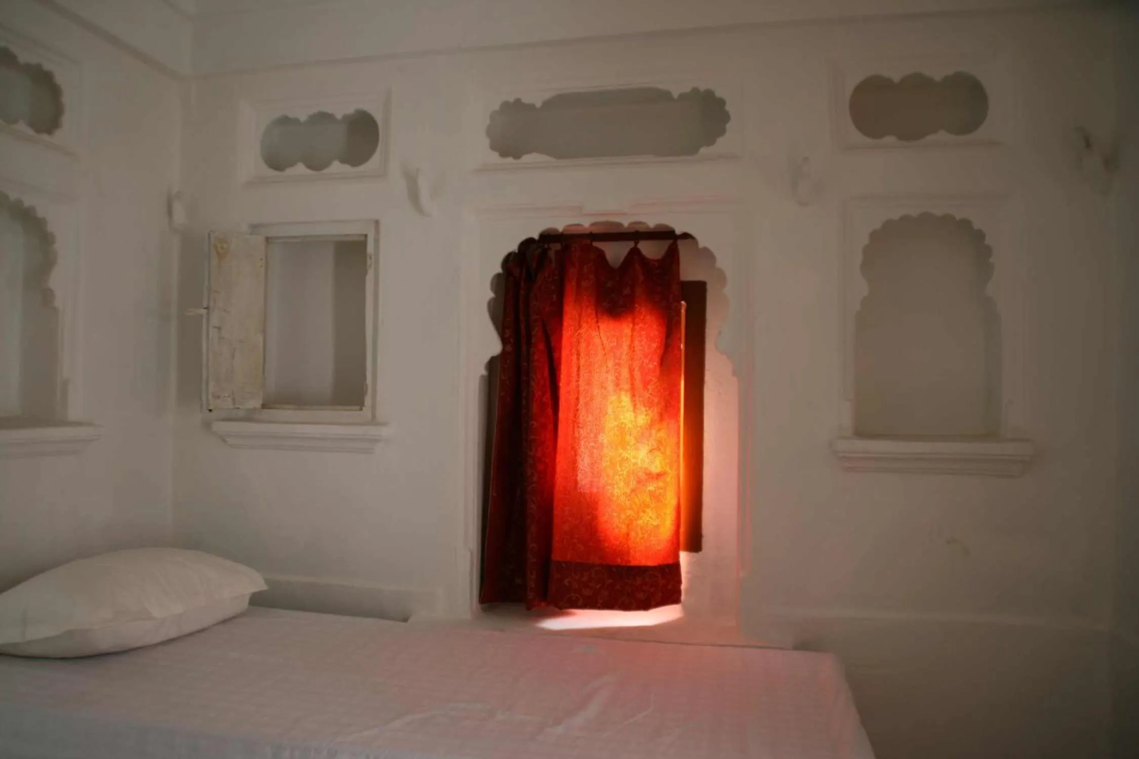 Decorative detail, Bed in Udai Haveli Guest House