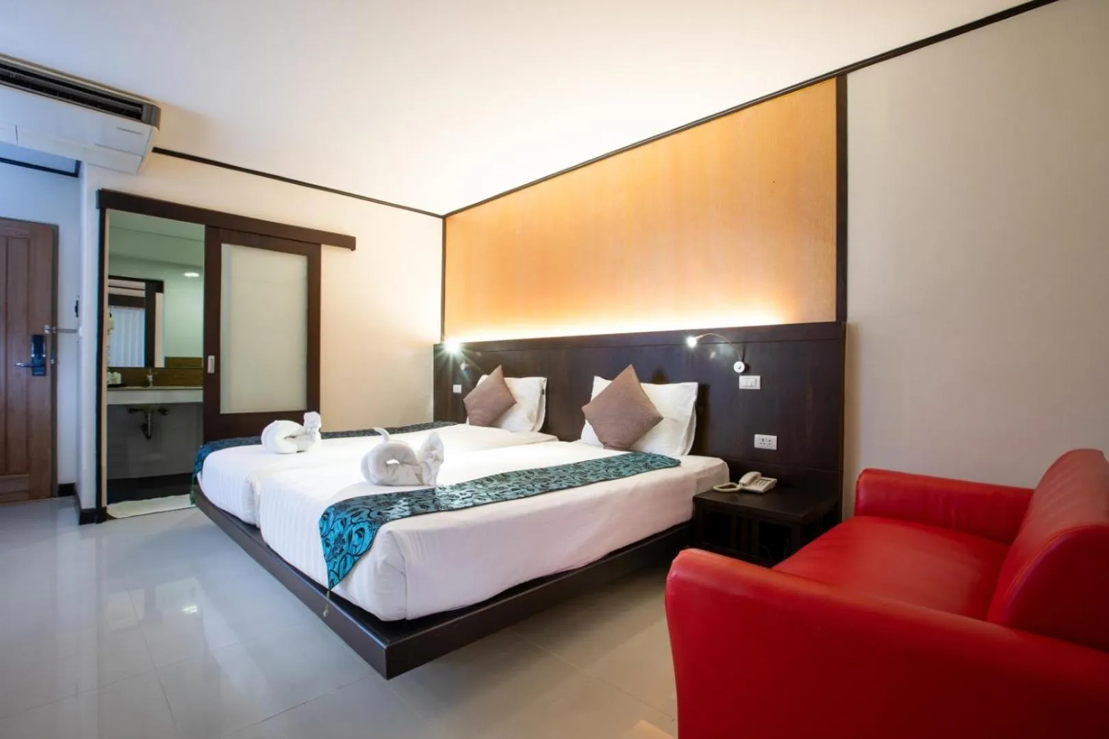 Bed in Orchid Garden Hotel Patong