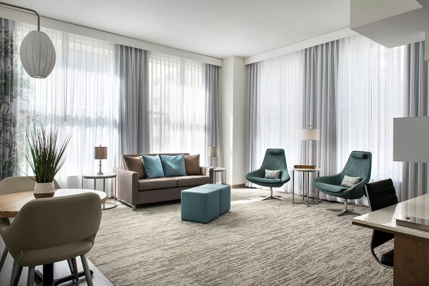 Seating area in EVEN Hotel Pittsburgh Downtown by IHG