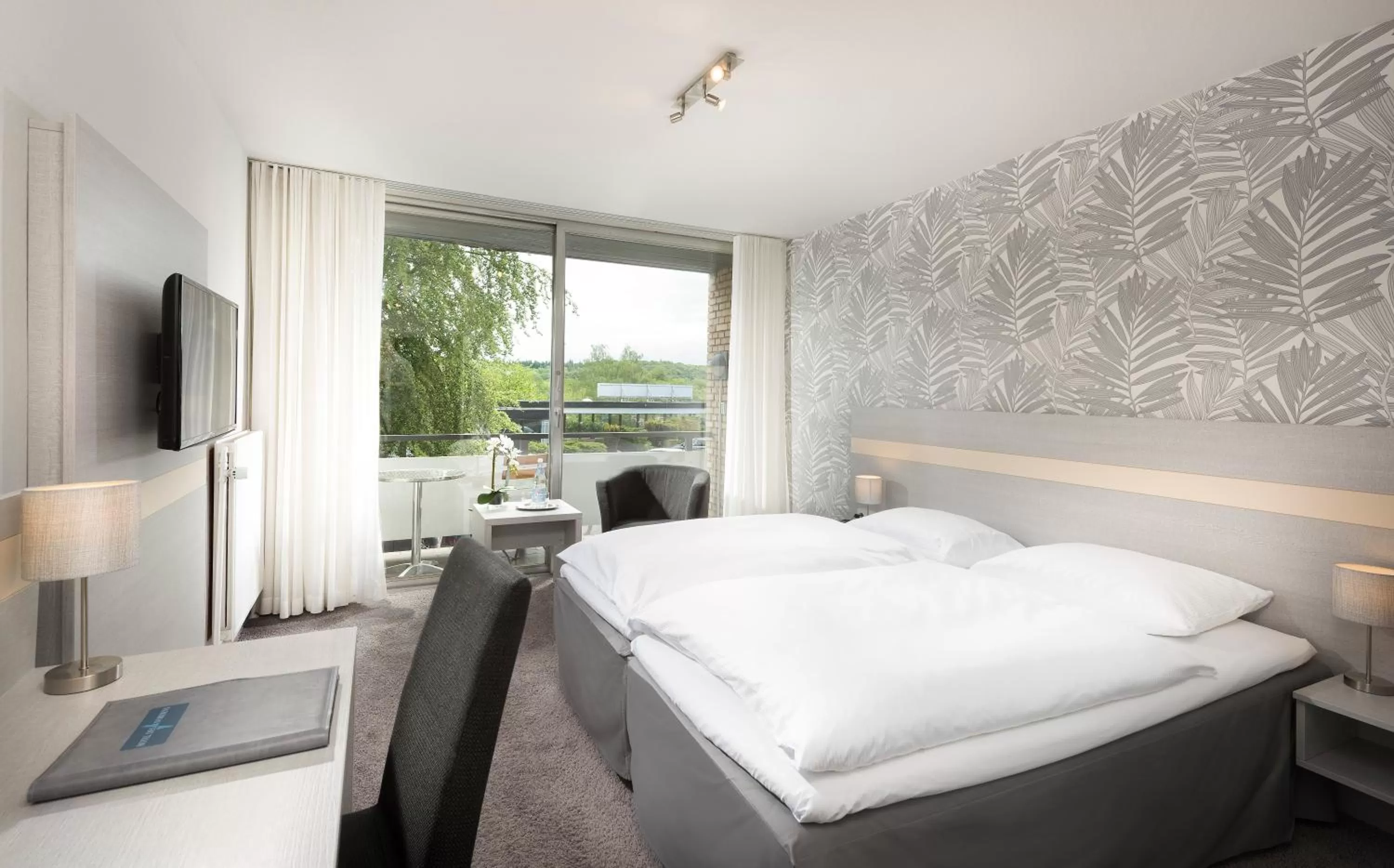 Bed in Hotel des Nordens Flensburg Wellness & Spa
