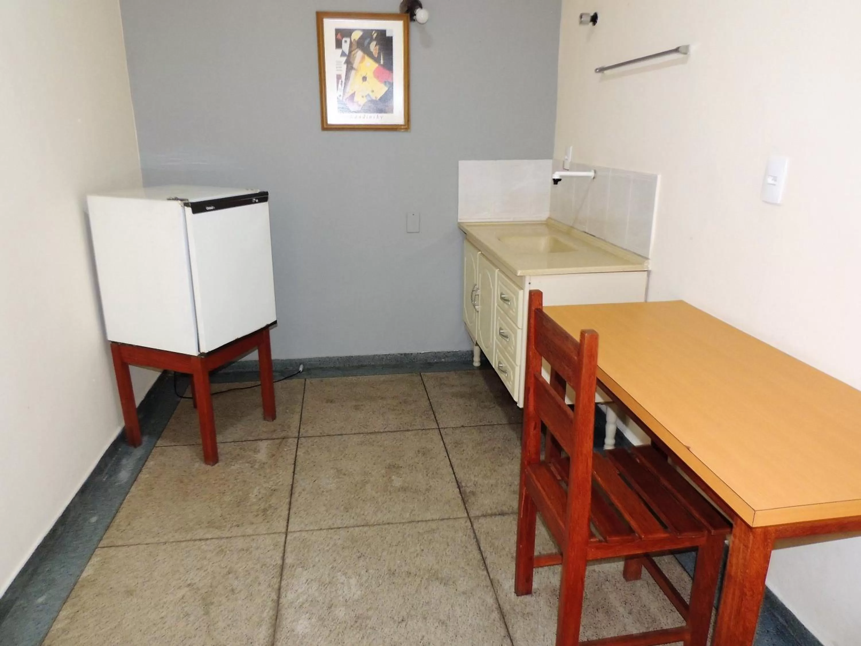 Bedroom, Kitchen/Kitchenette in Hotel Líder - By UP Hotel