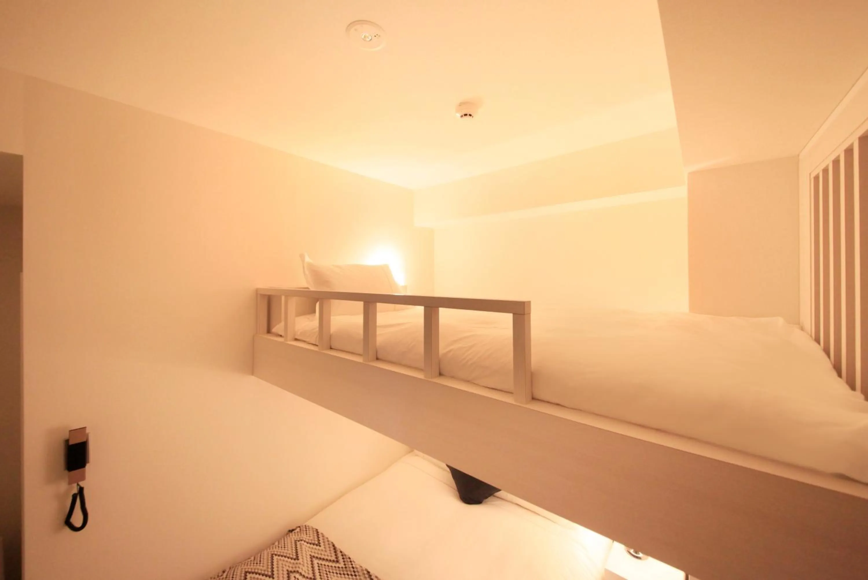 Photo of the whole room, Bed in Centurion Hotel Residential Akasaka Station