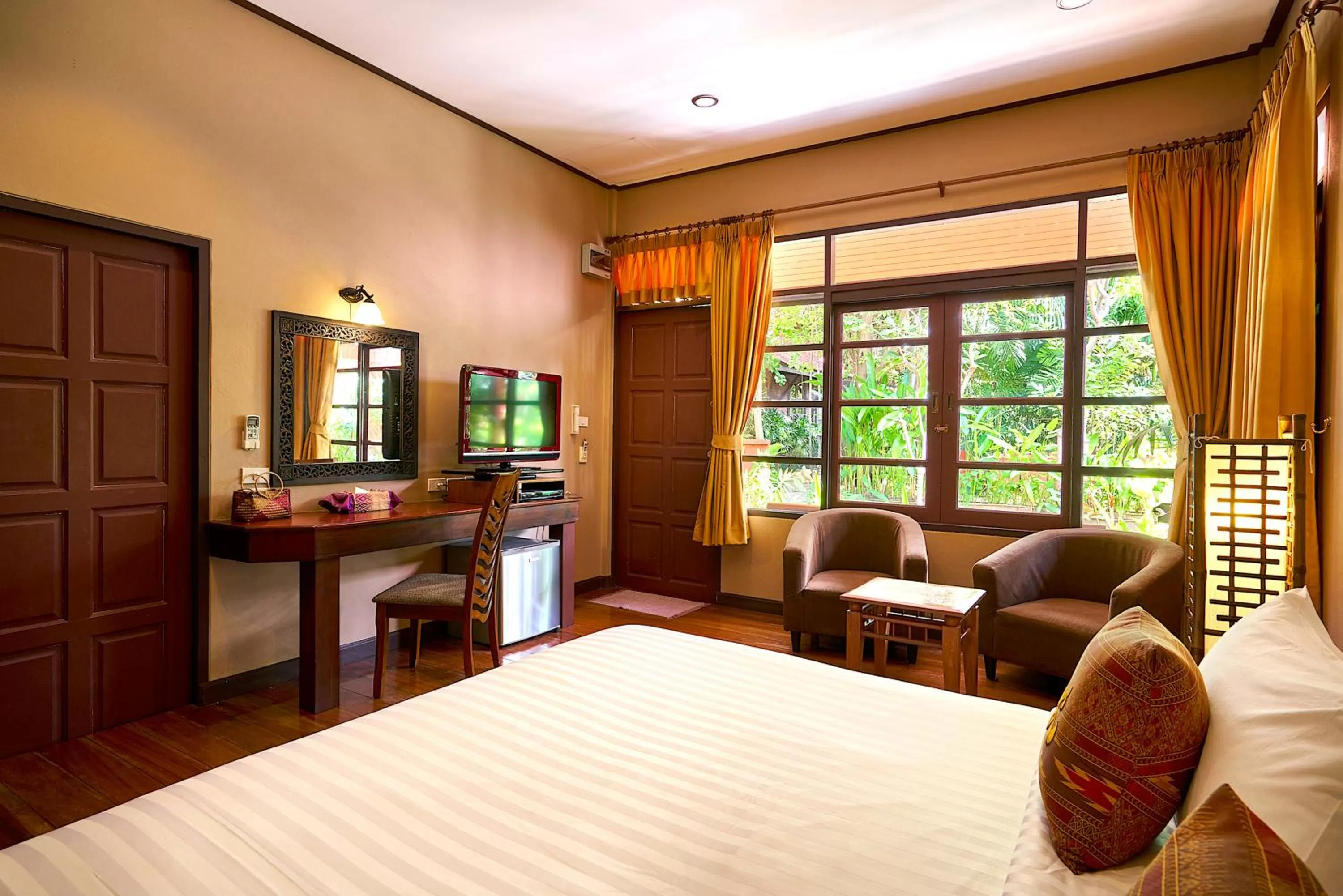 Bed in Ruenkanok Thaihouse Resort