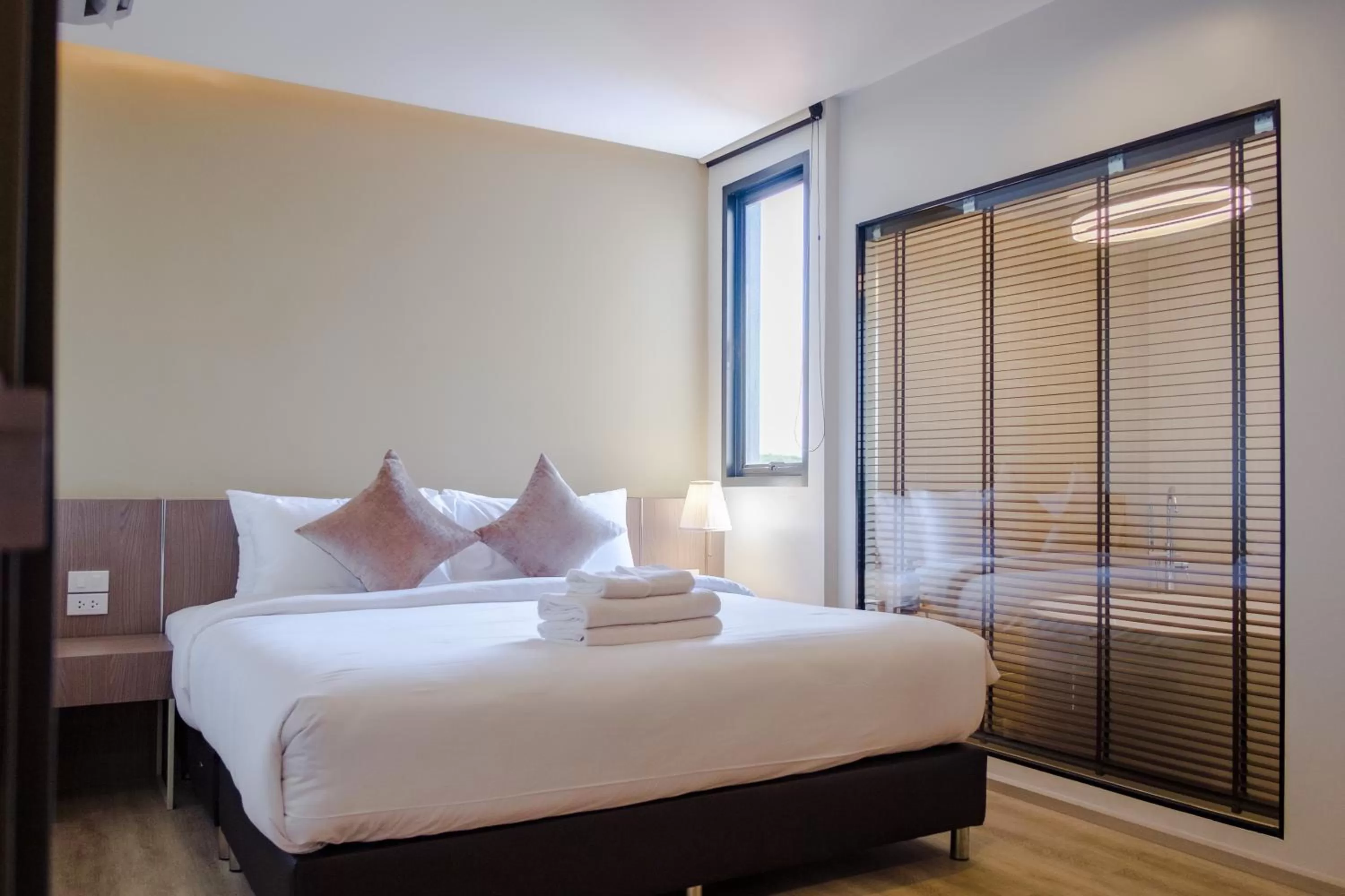 Bed in The Rise Suites Hotel, Chiang Mai - SHA Extra Plus