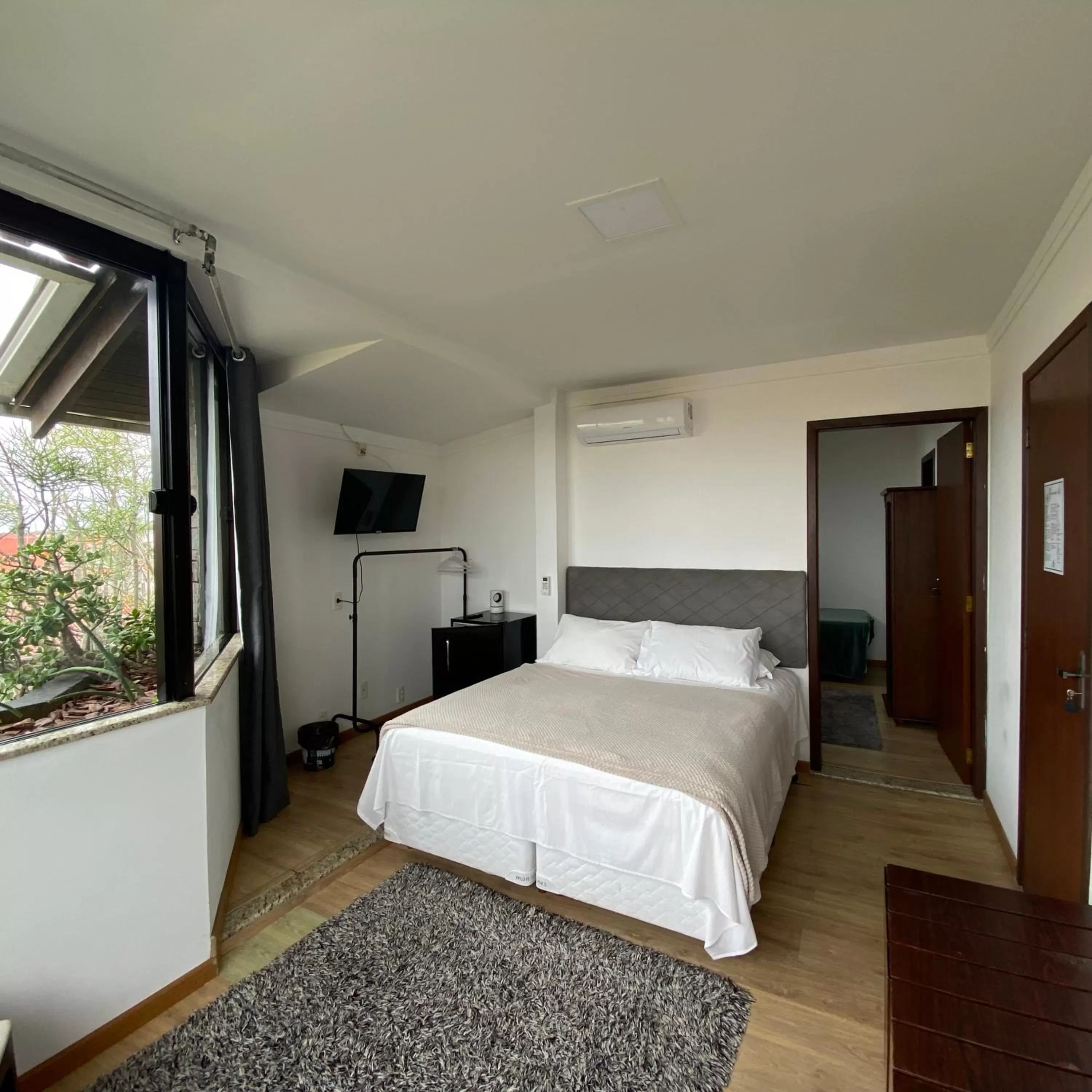 Bed in Pousada Casa da Praia