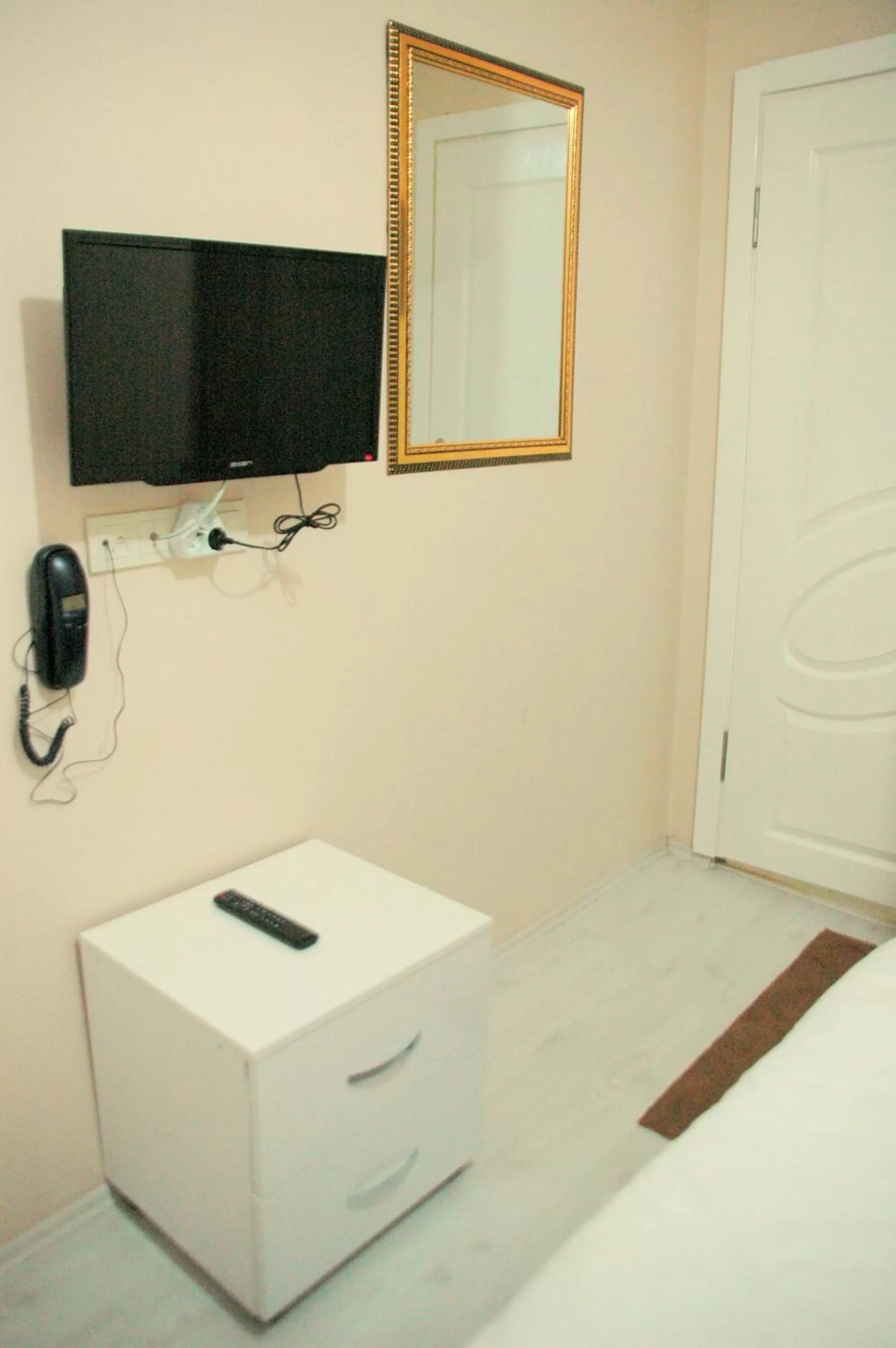 Decorative detail, TV/Entertainment Center in Tolga Hotel