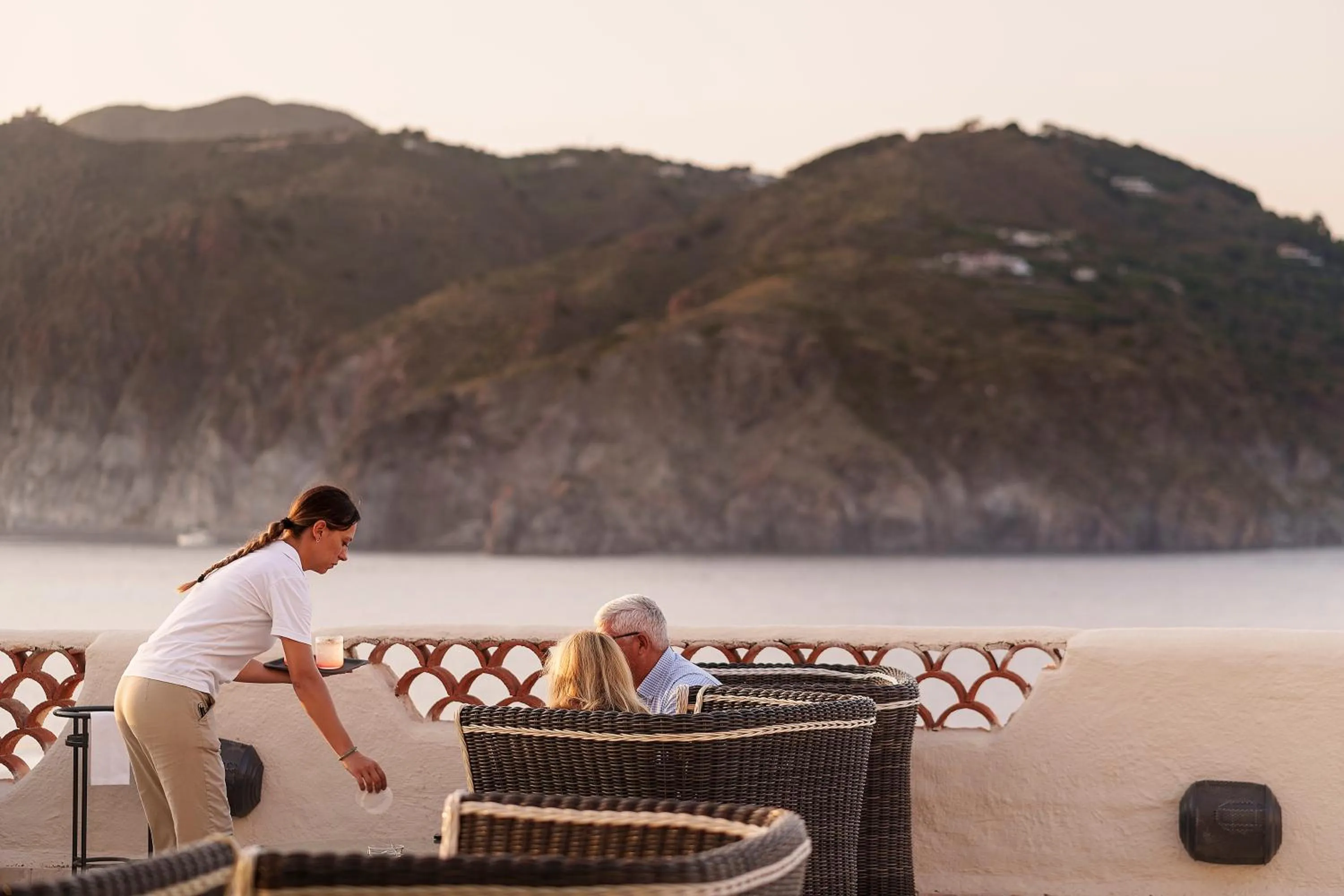 People in Therasia Resort Sea and SPA - The Leading Hotels of the World