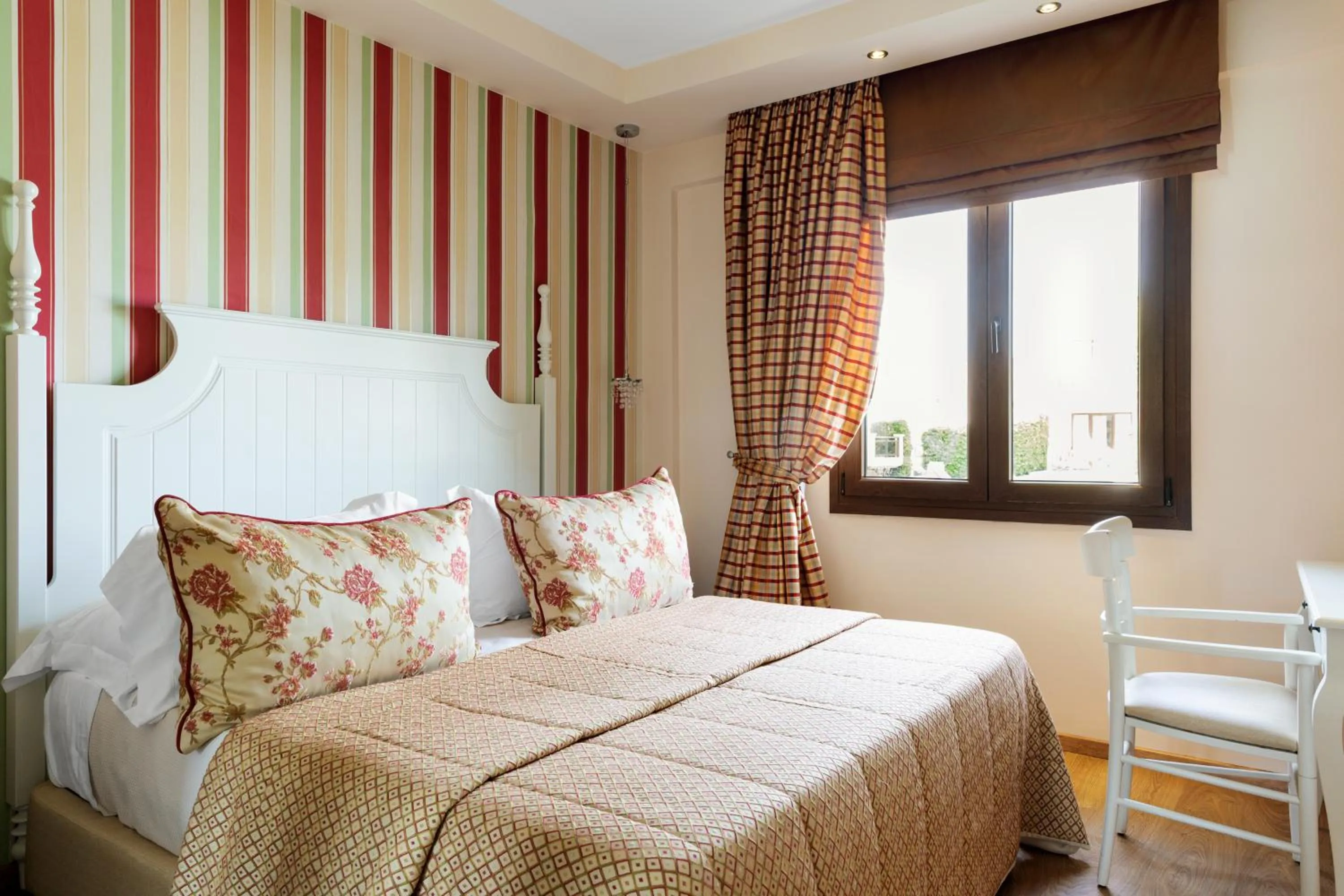 Bed in Mediterranean Village Hotel & Spa