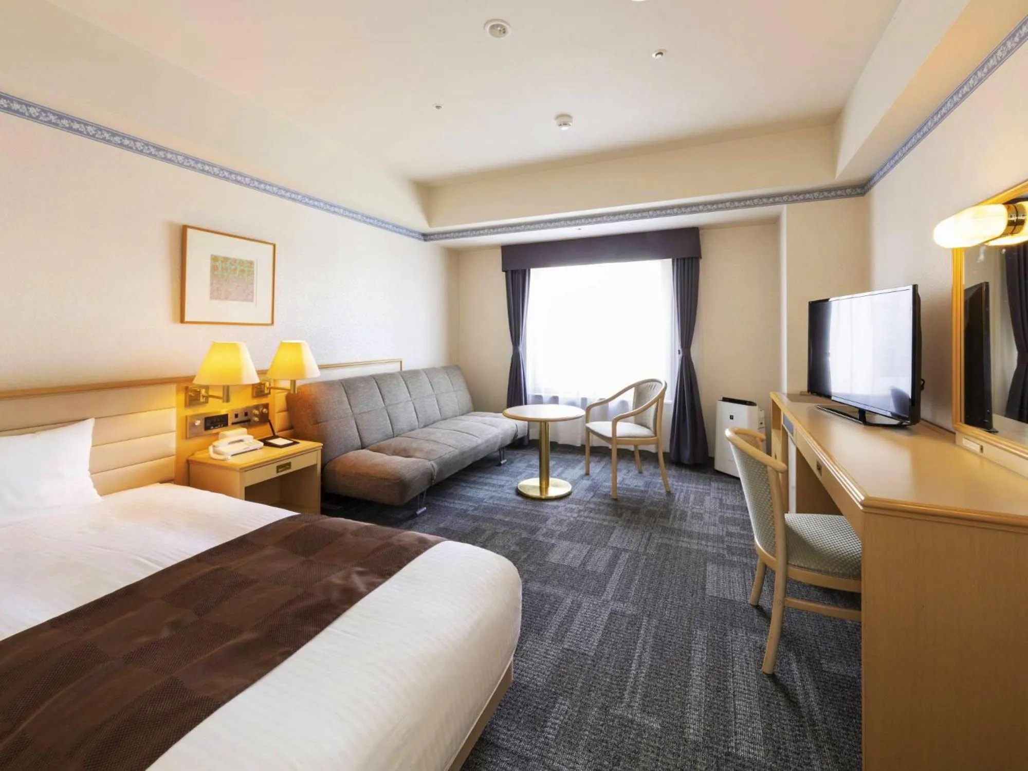 Bed in Hotel Sapporo Garden Palace