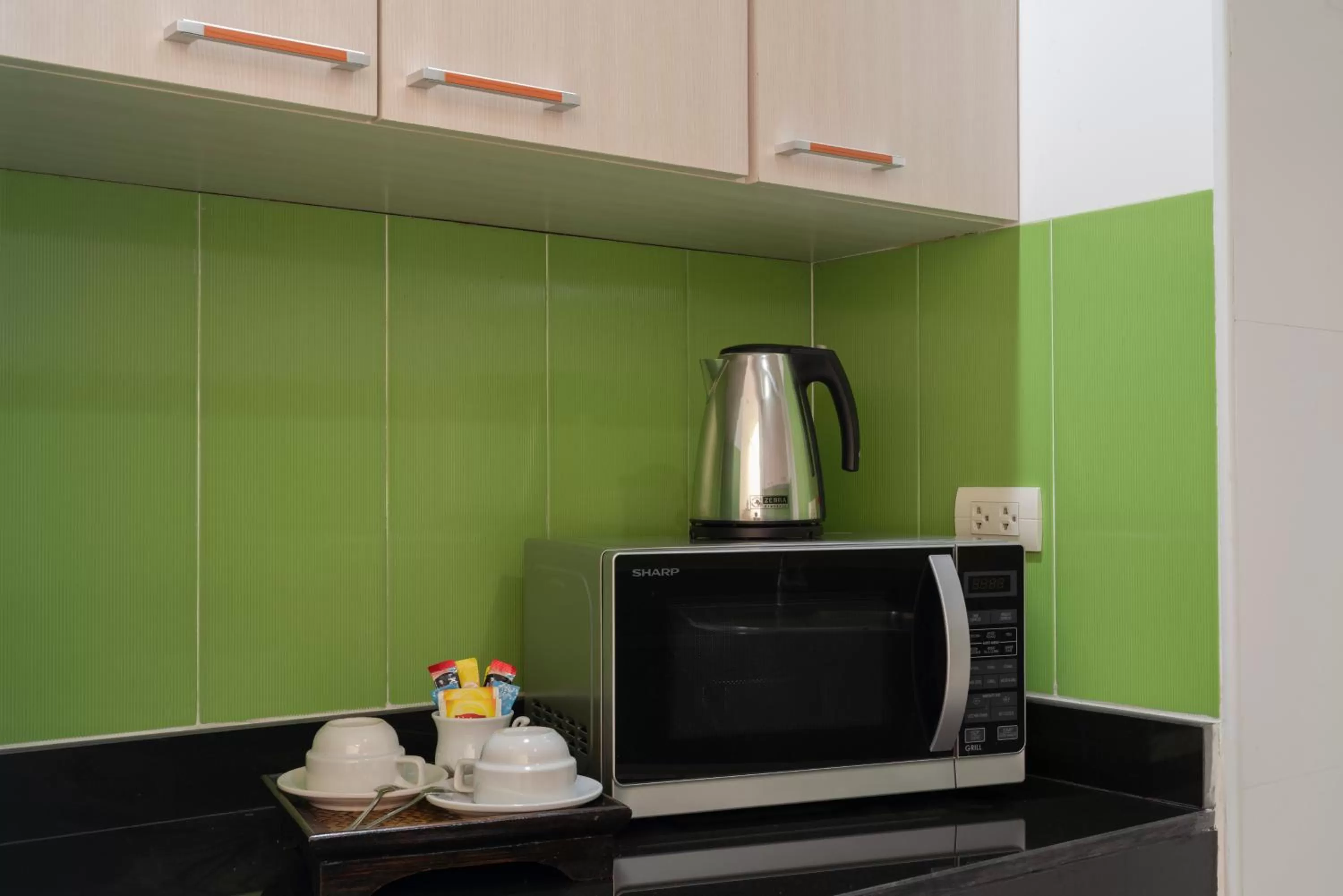 Kitchen or kitchenette in At 115 Hotel By Rompo