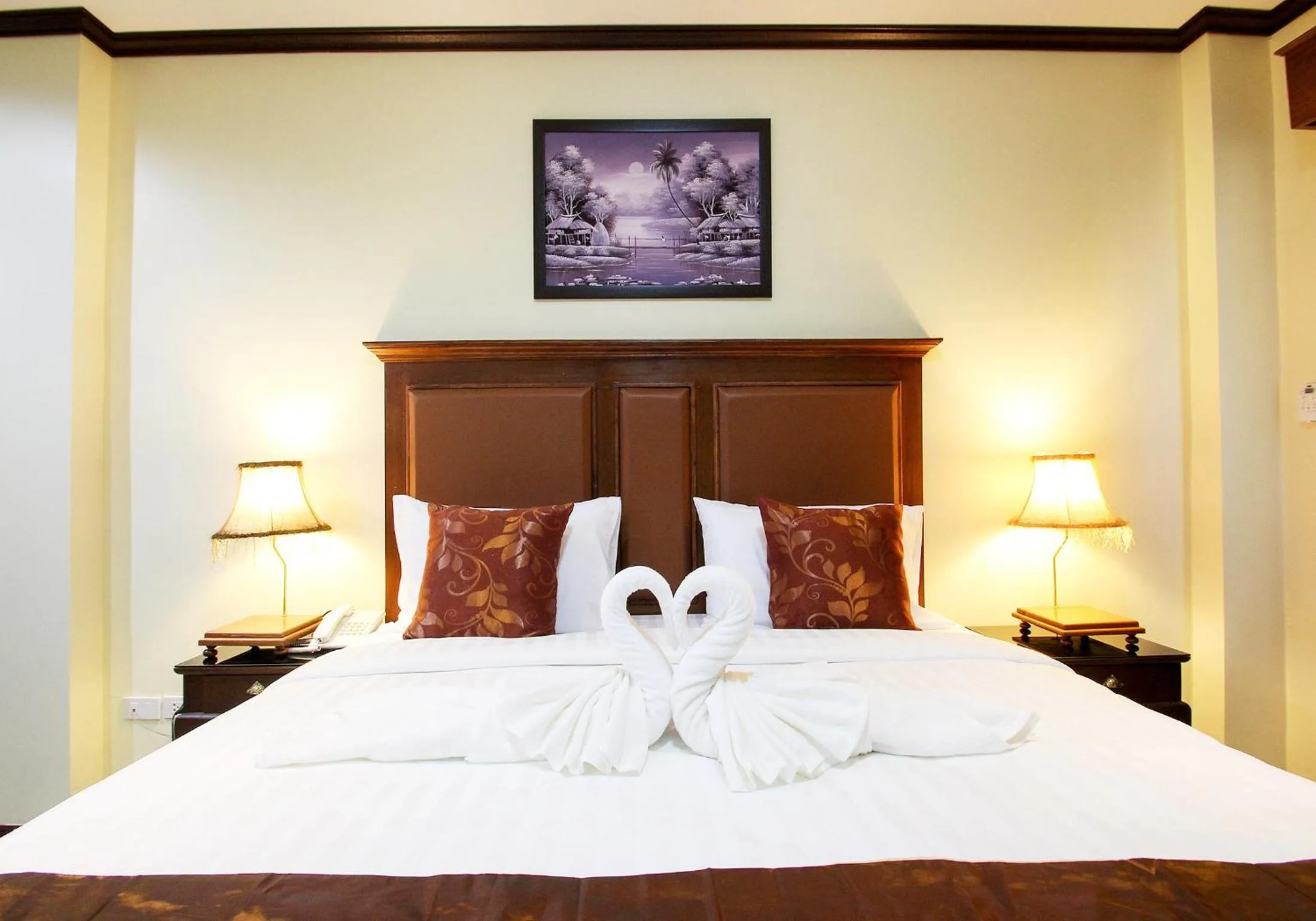 Bed in i Boutique Hotel