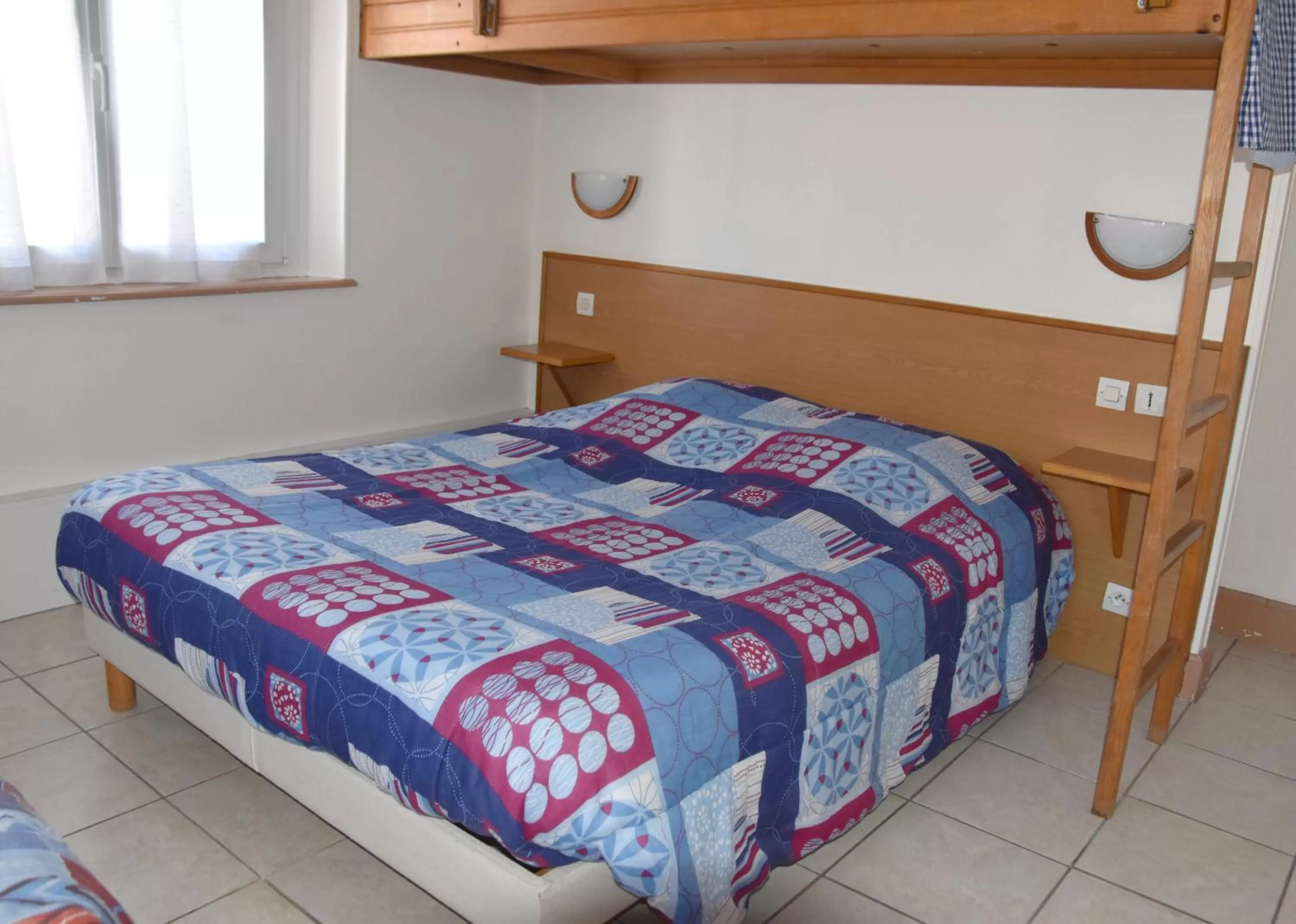 Bed in Hotel Gai Relais