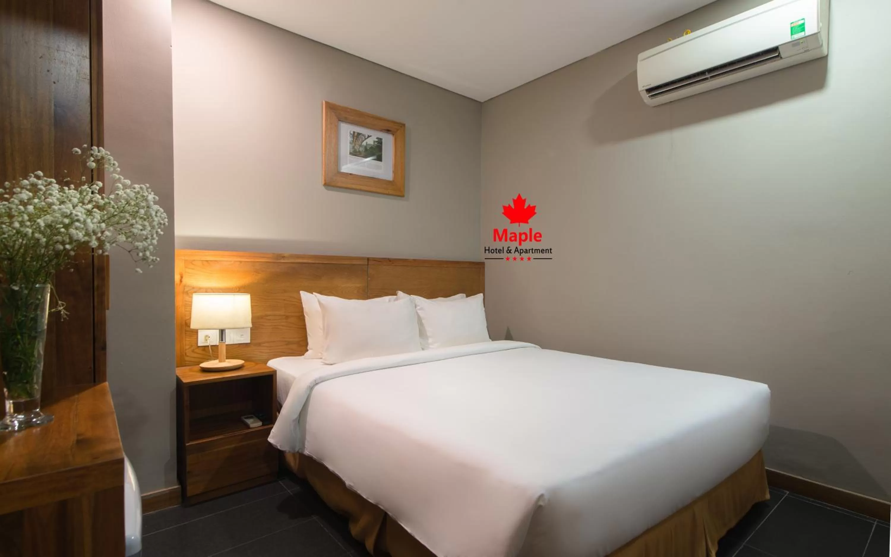 Bed in Maple Hotel & Apartment