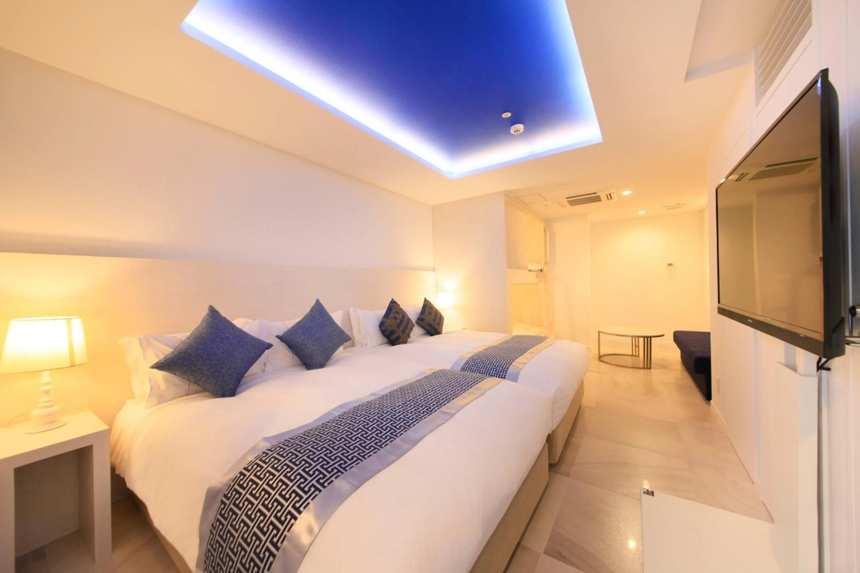 Photo of the whole room, Bed in Centurion Hotel Residential Akasaka Station