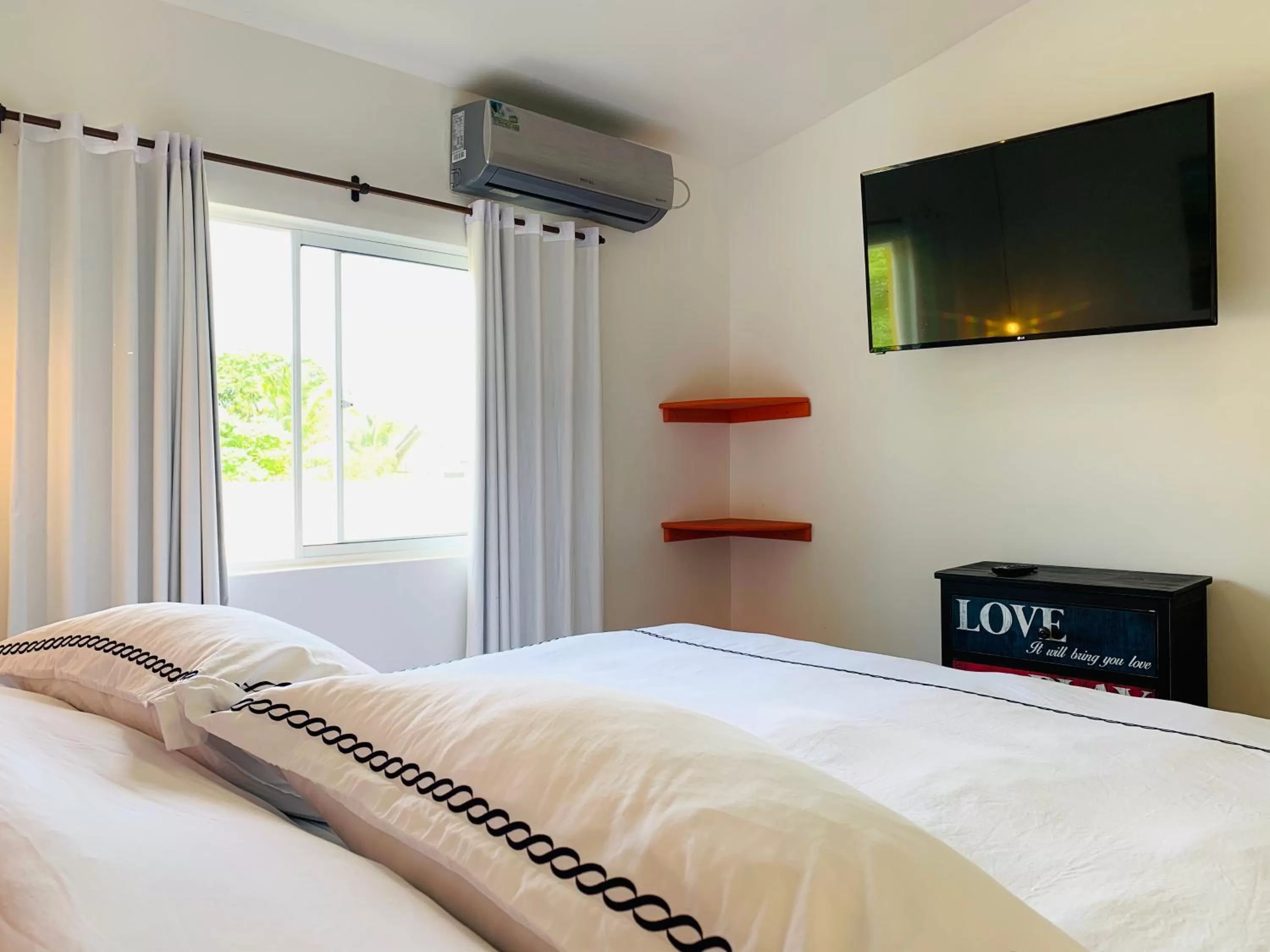 Bed in Be Happy Hotel