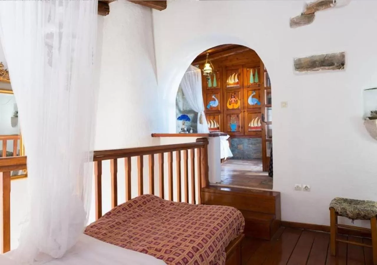 Bedroom, TV/Entertainment Center in The Traditional Homes of Crete