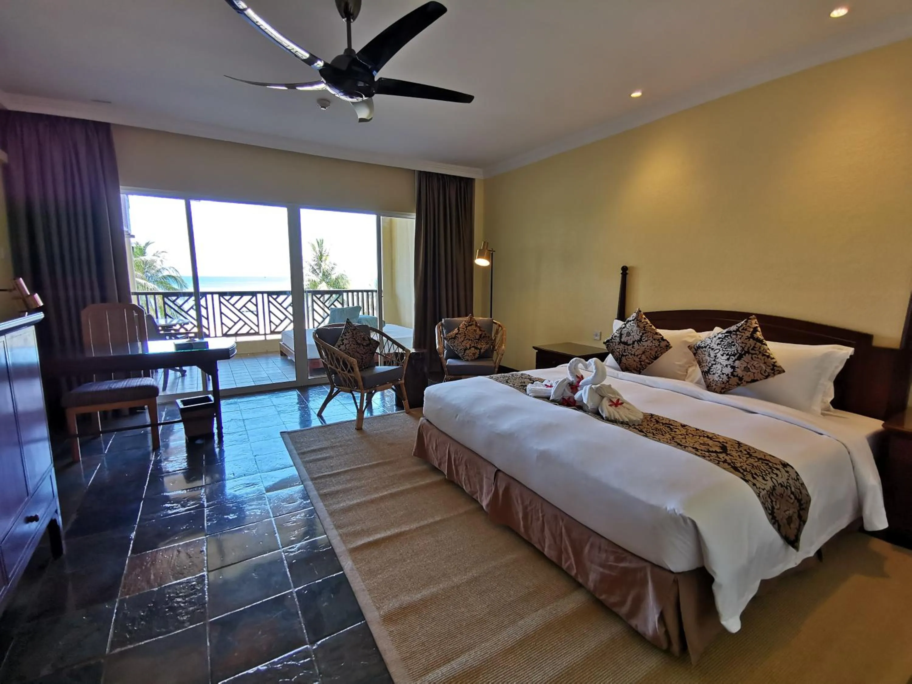 Bed in Palm Beach Resort & SPA