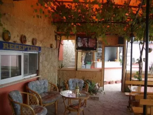 Communal lounge/ TV room in Hotel Poseidon