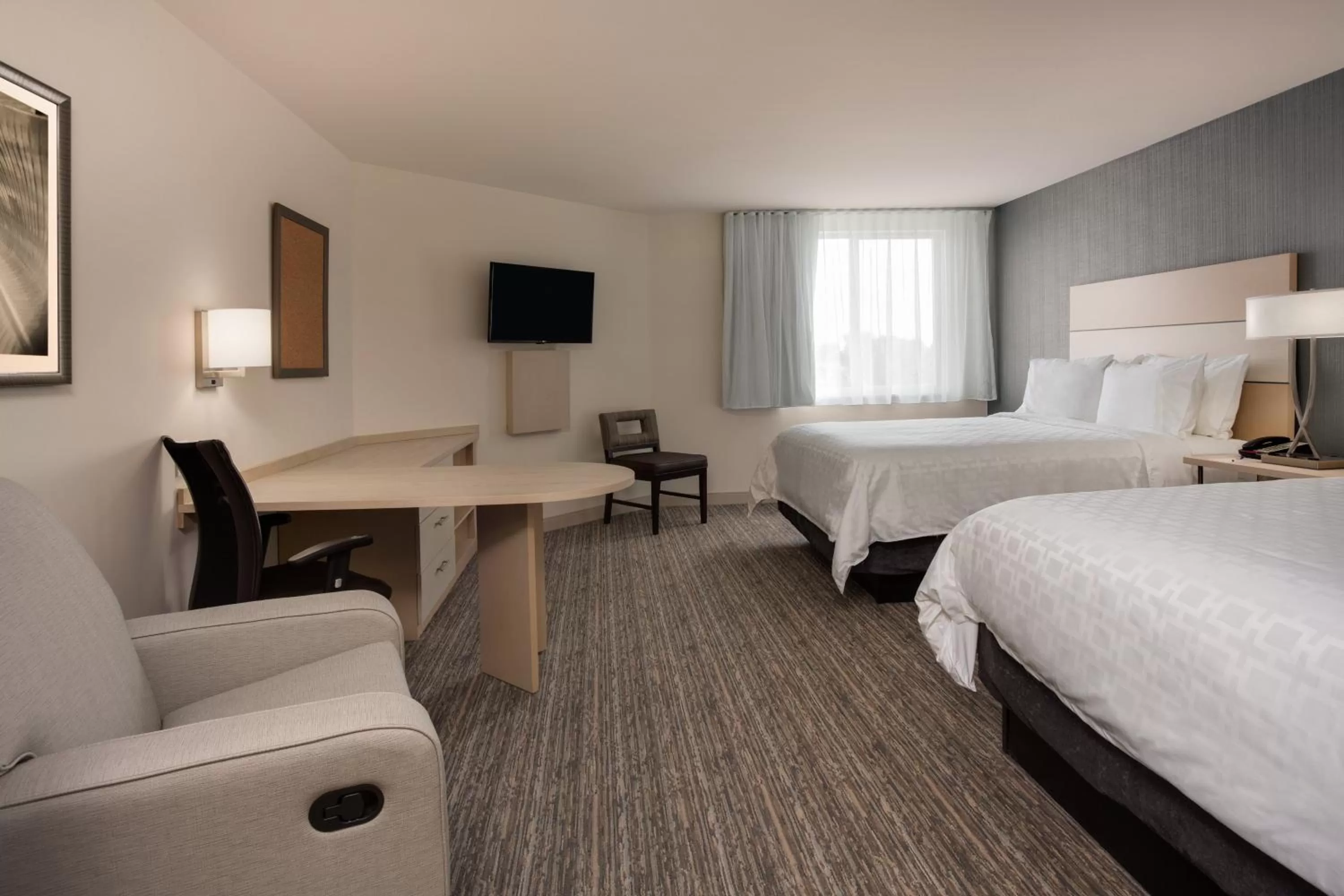 Photo of the whole room, Bed in Candlewood Suites Miami Intl Airport - 36th St by IHG