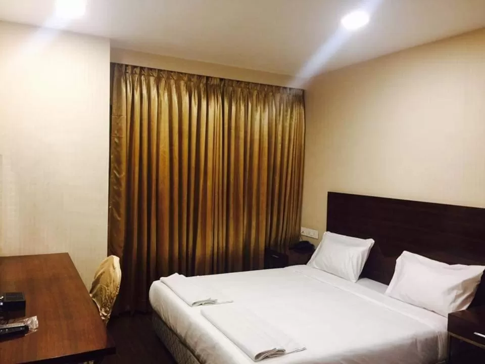 Bed in Layalee Grande Hotel Chennai