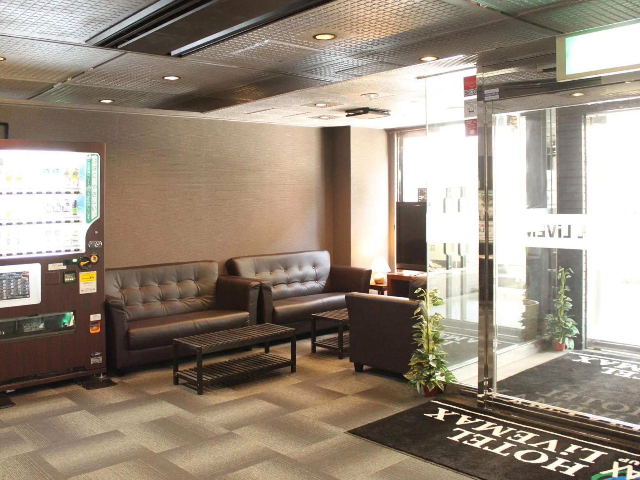 Lobby or reception in HOTEL LiVEMAX BUDGET Chofu-Ekimae
