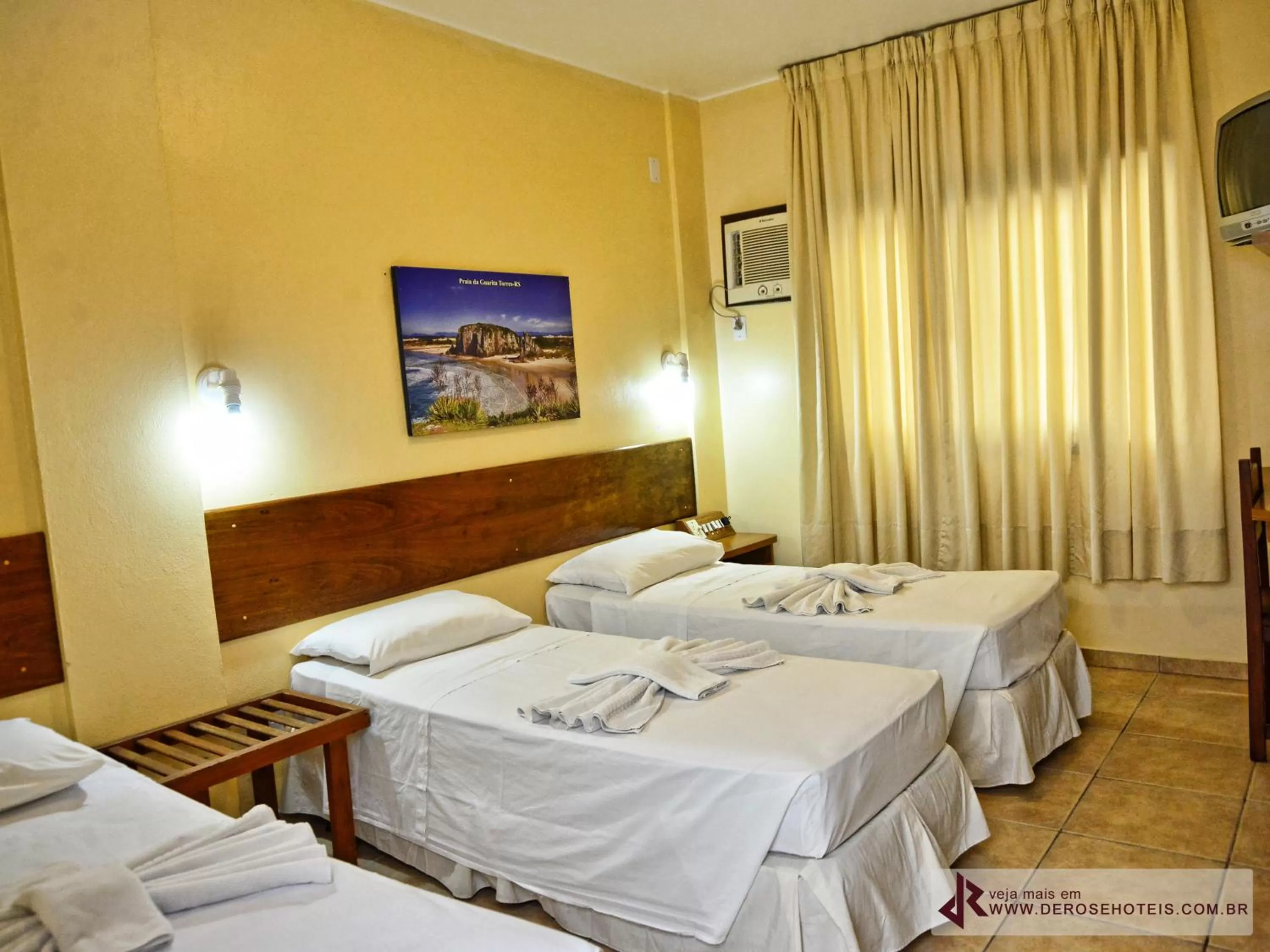 Bed in De Rose Palace Hotel