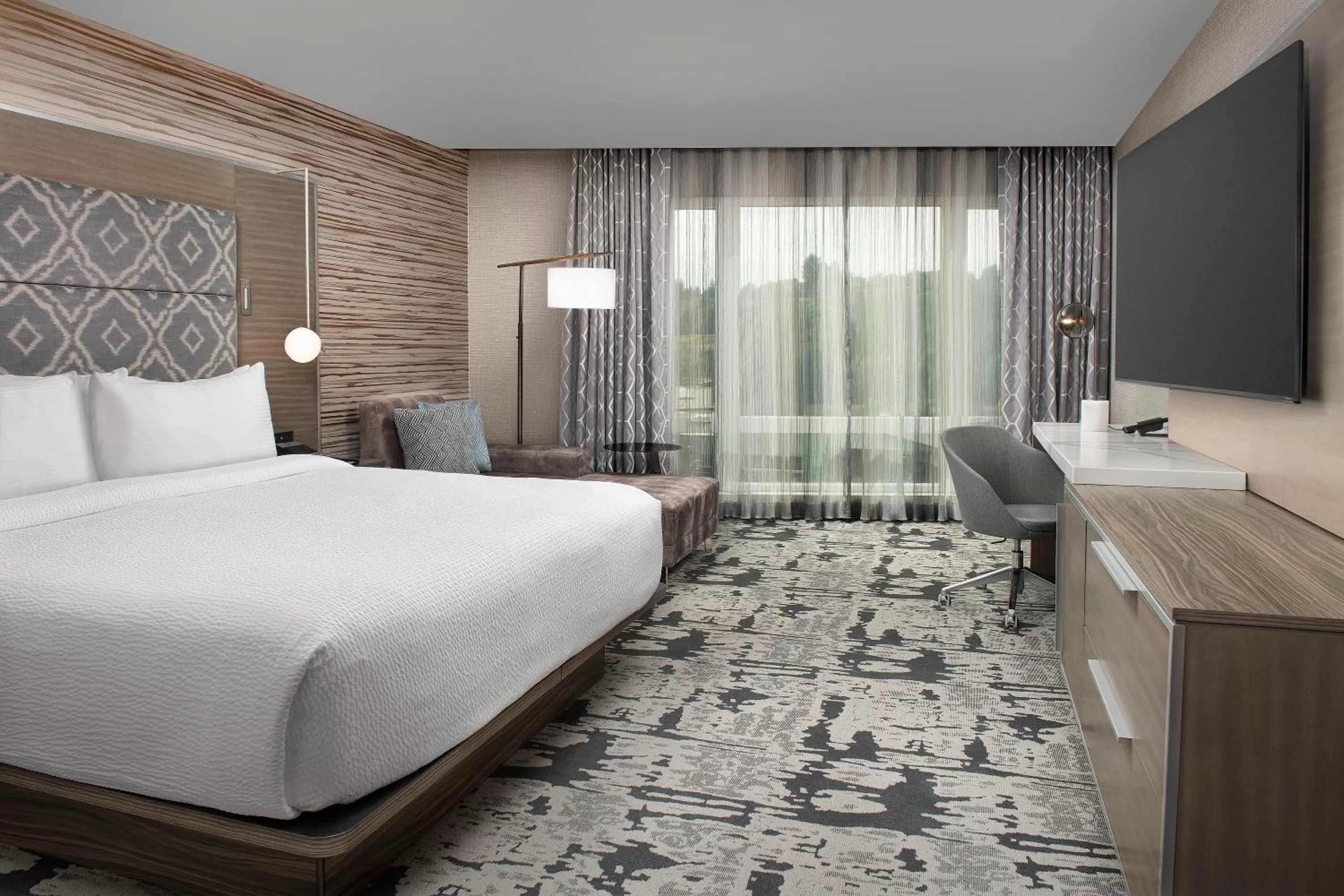 Bed in Silver Cloud Hotel Tacoma at Point Ruston Waterfront