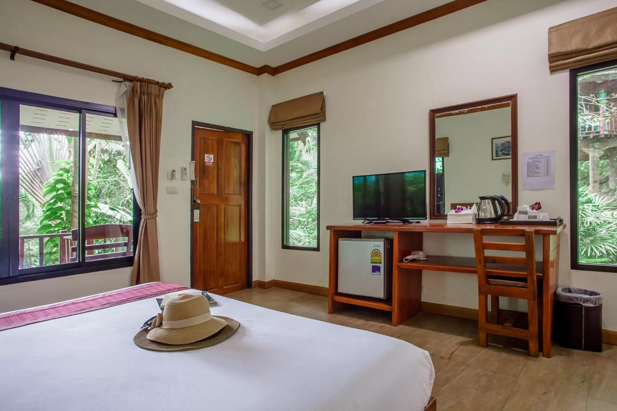 Bed in The Vatika Resort and Spa