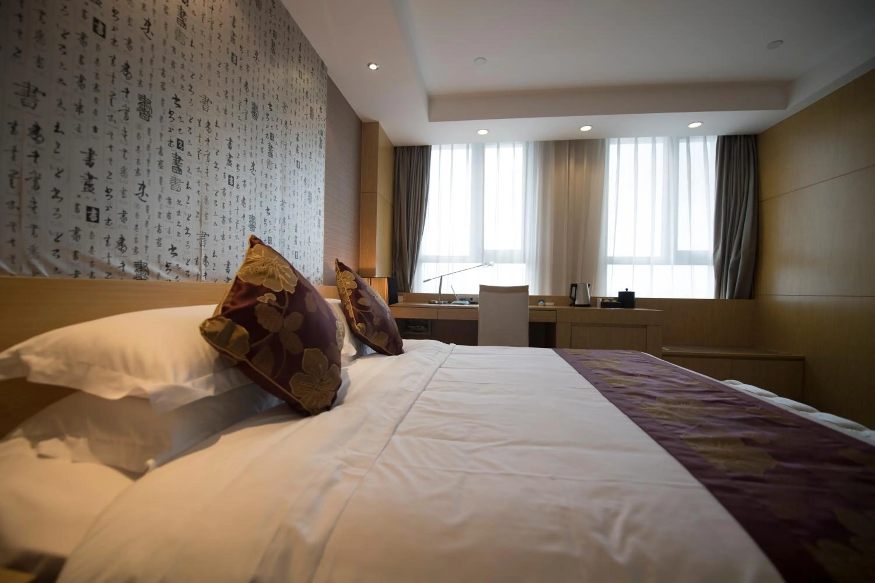 Bed in Suzhou Sun Plaza Hotel