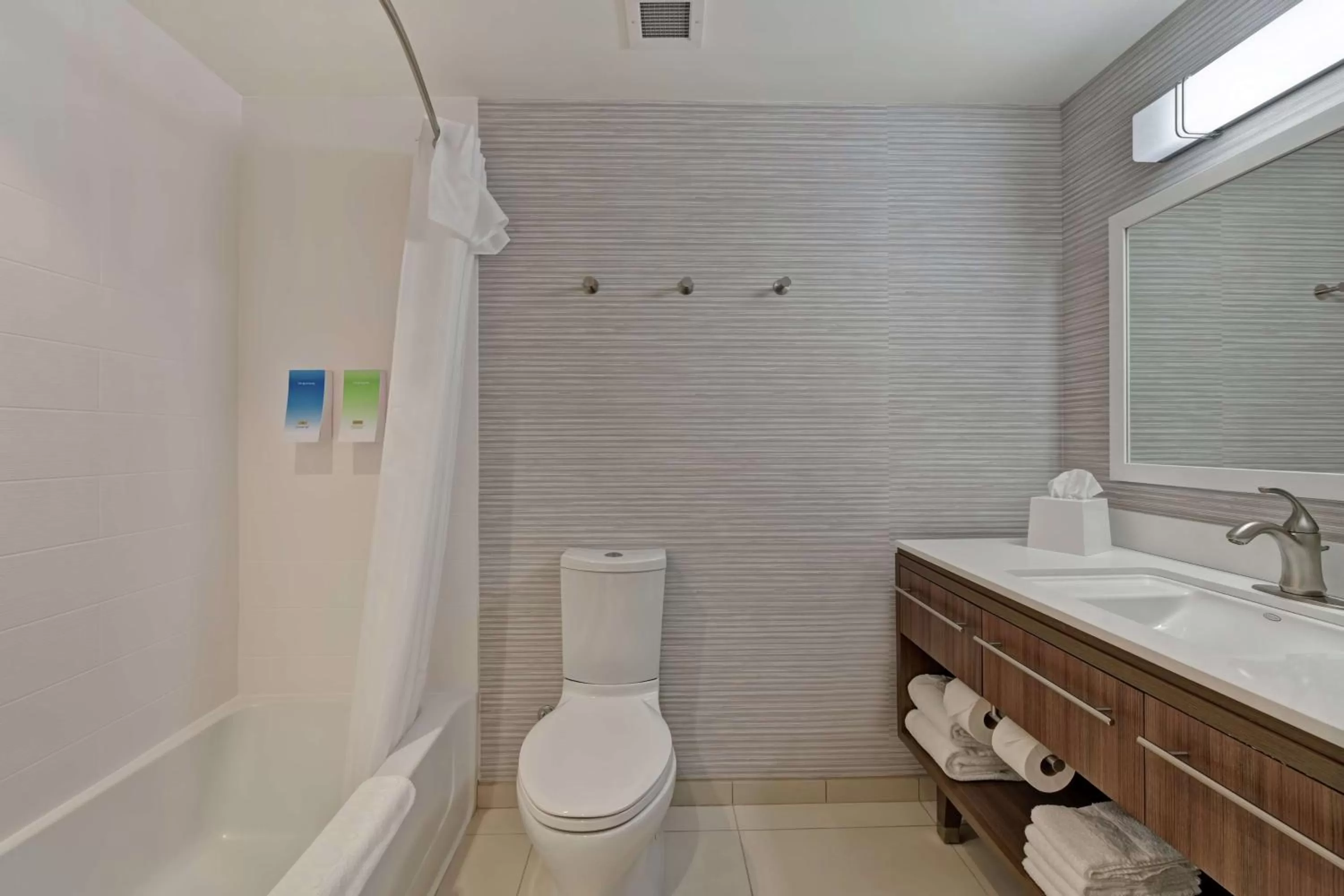 Bathroom in Home2 Suites By Hilton West Palm Beach Airport