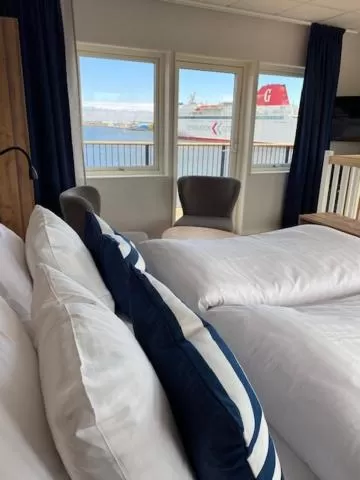 Twin Room with Balcony in Badholmen Restaurang & Rum