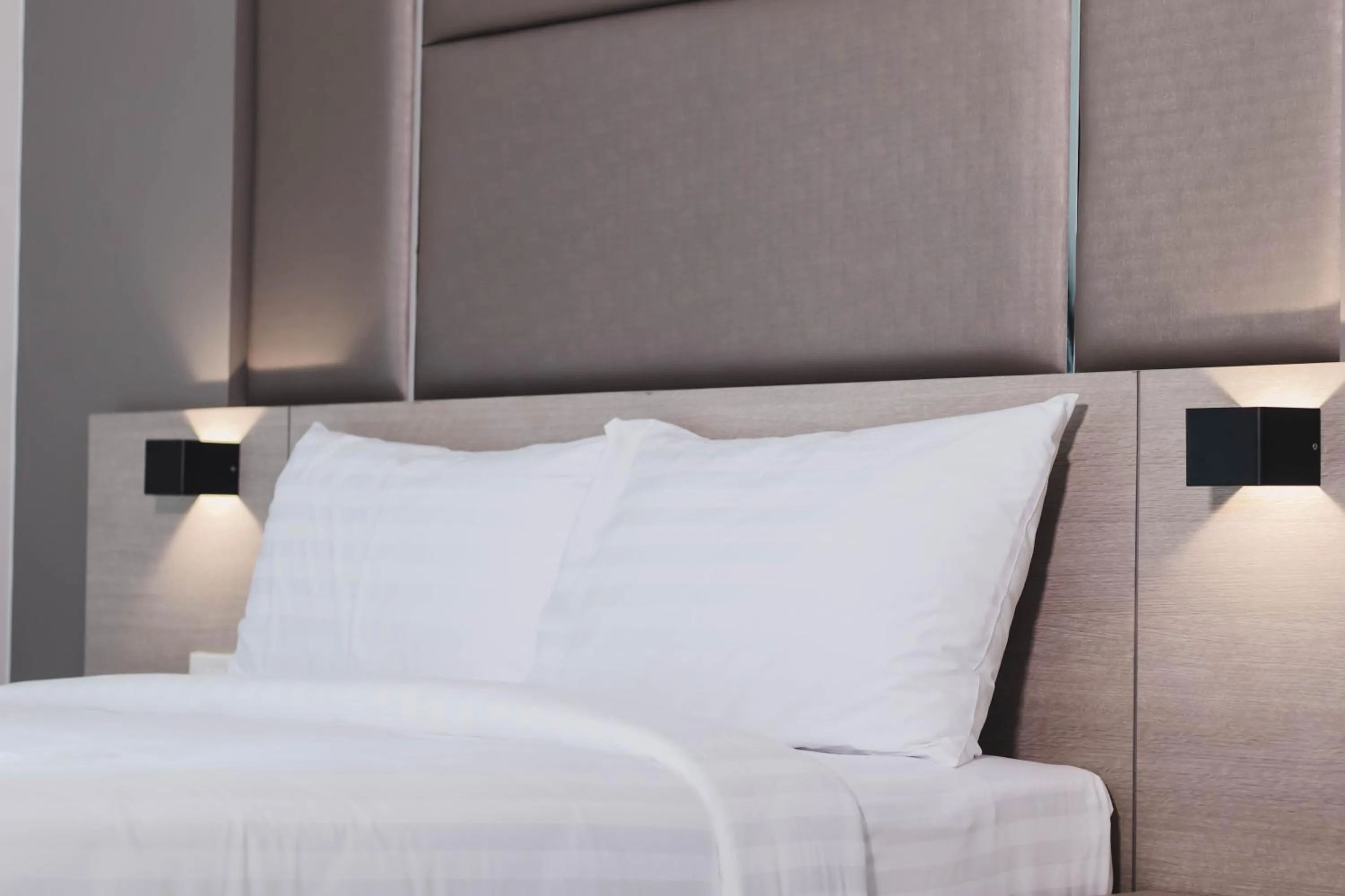 Bed in So good Hotel Bangkok