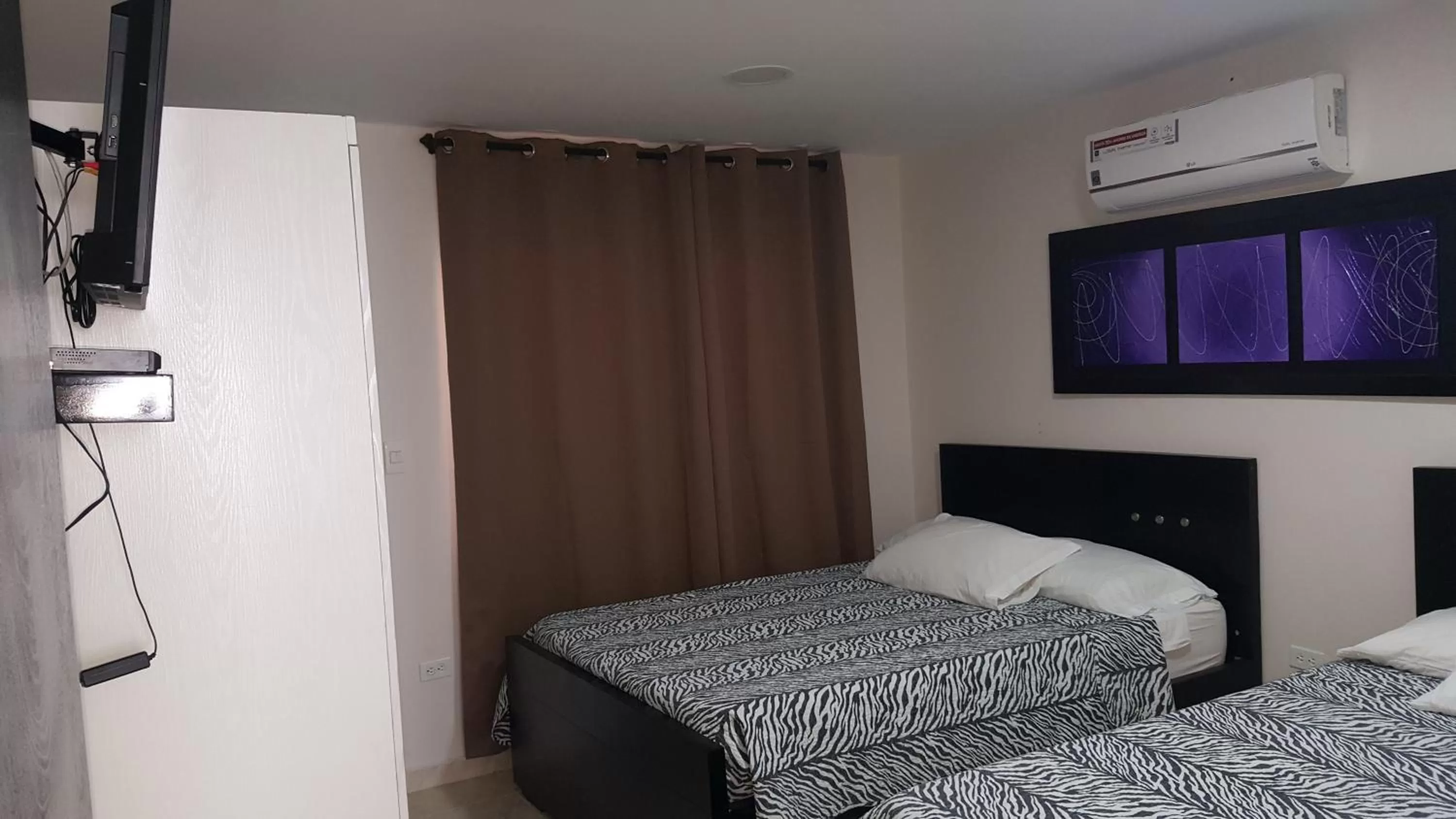 Bed in Caribbean Island Hotel Piso 2