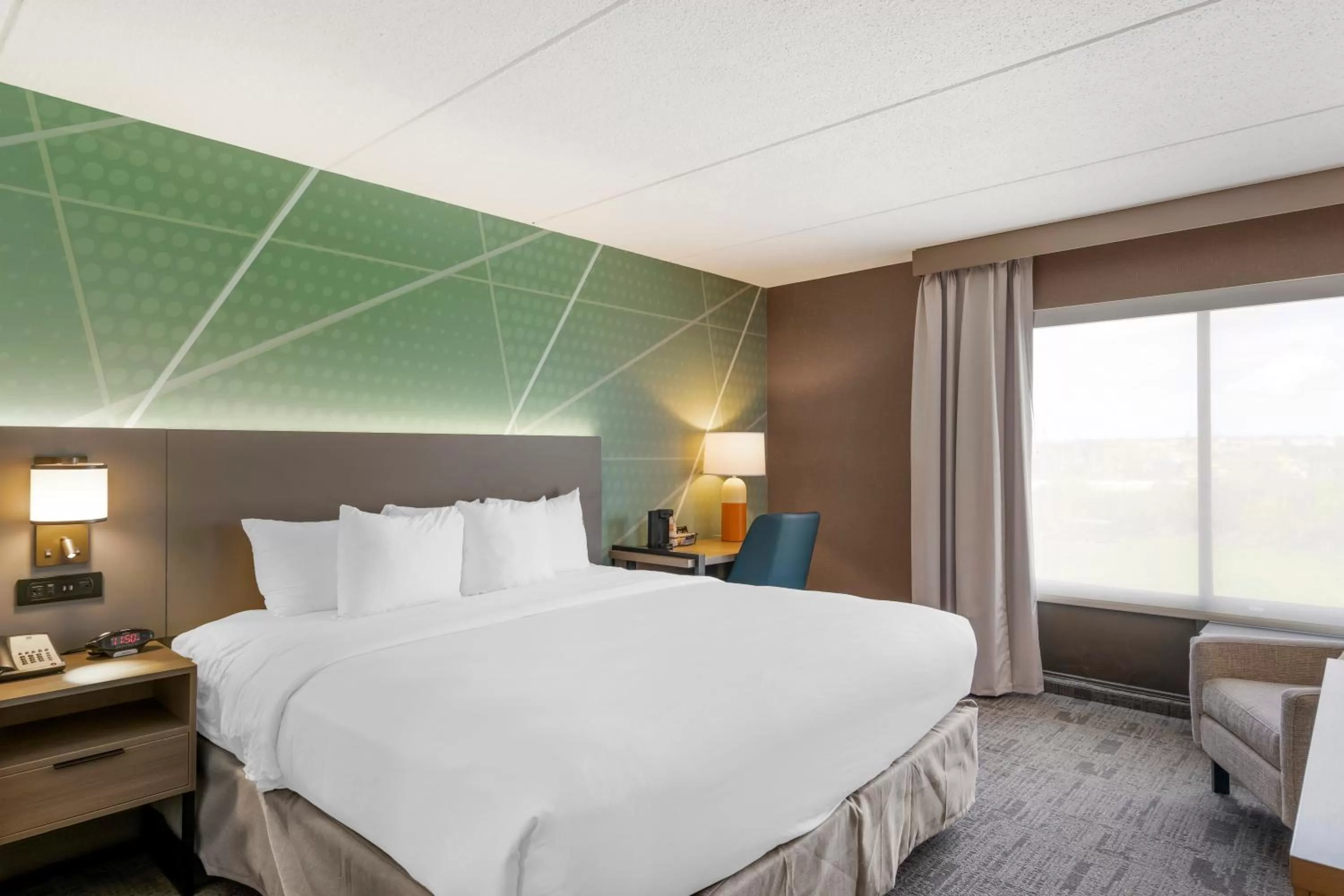 Bed in Comfort Inn & Suites Watertown - 1000 Islands