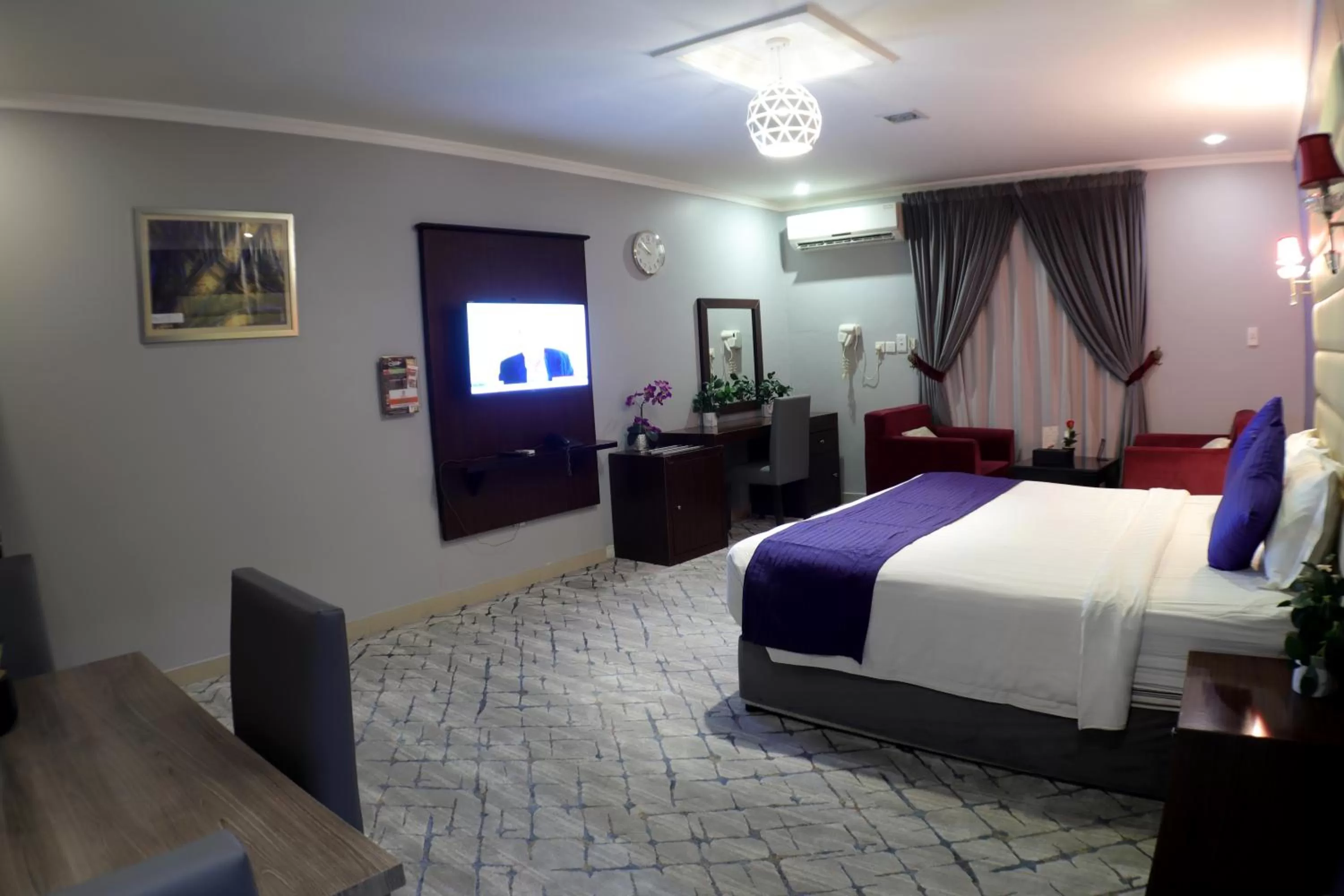 TV and multimedia, Bed in Maskan Al Dyafah Hotel Apartments