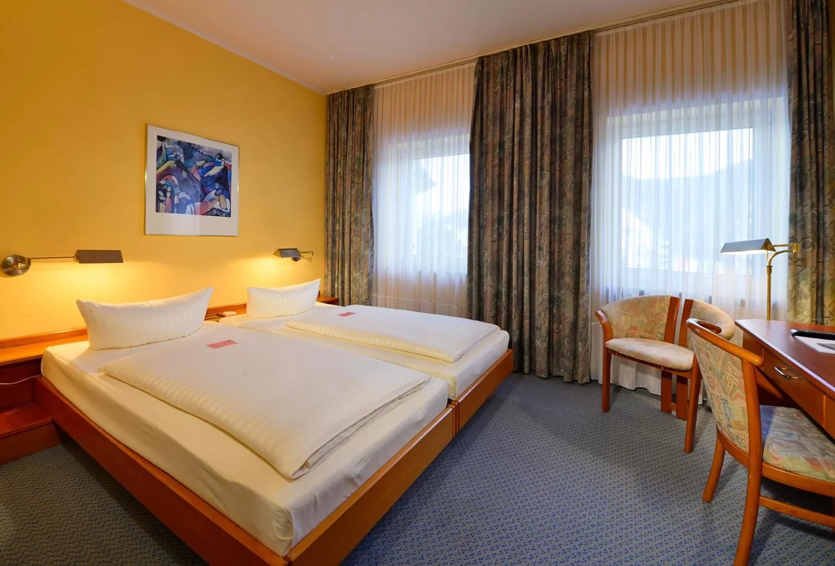 Bed in Rheinhotel Vier Jahreszeiten Bad Breisig