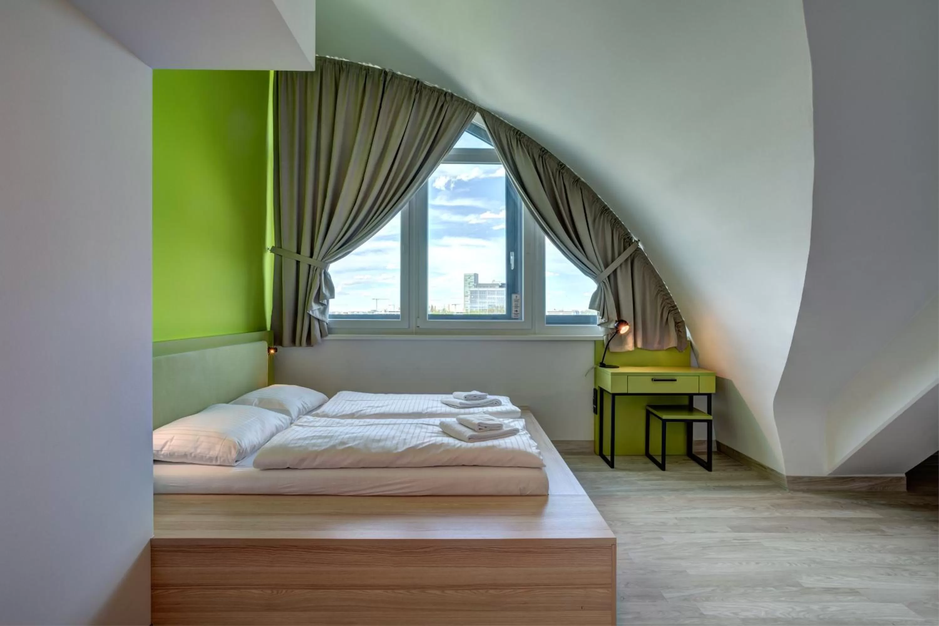 Photo of the whole room, Bed in MEININGER Hotel München Olympiapark