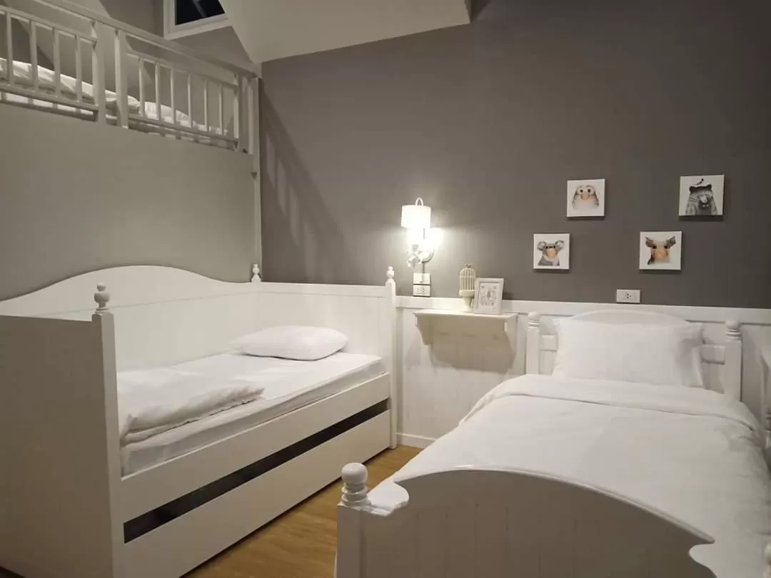 Bed in Baan JaoKorKluay บ้านเจ้ากอกล้วย