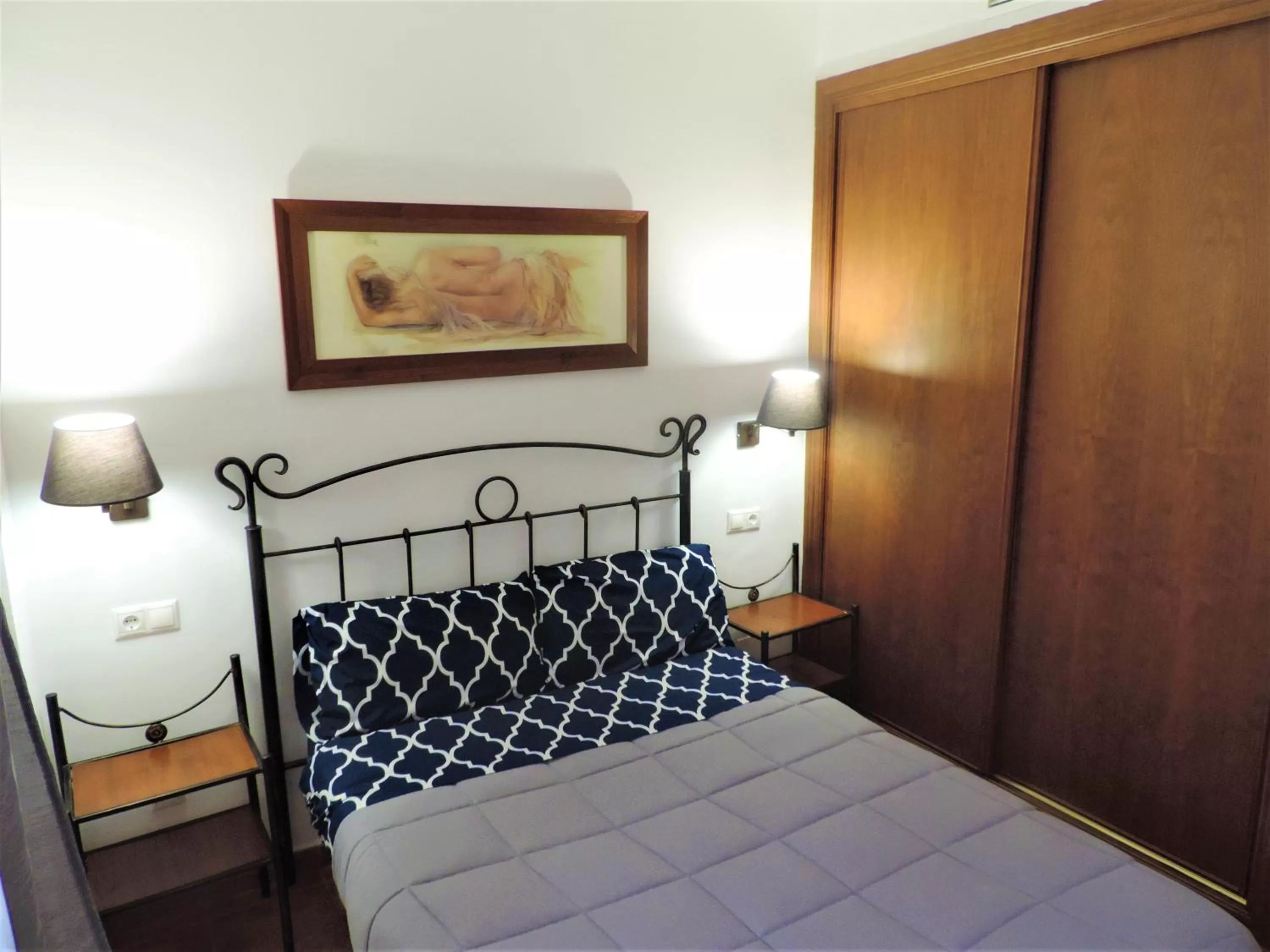 Bed in APARTAMENTOS CASERIA DE COMARES