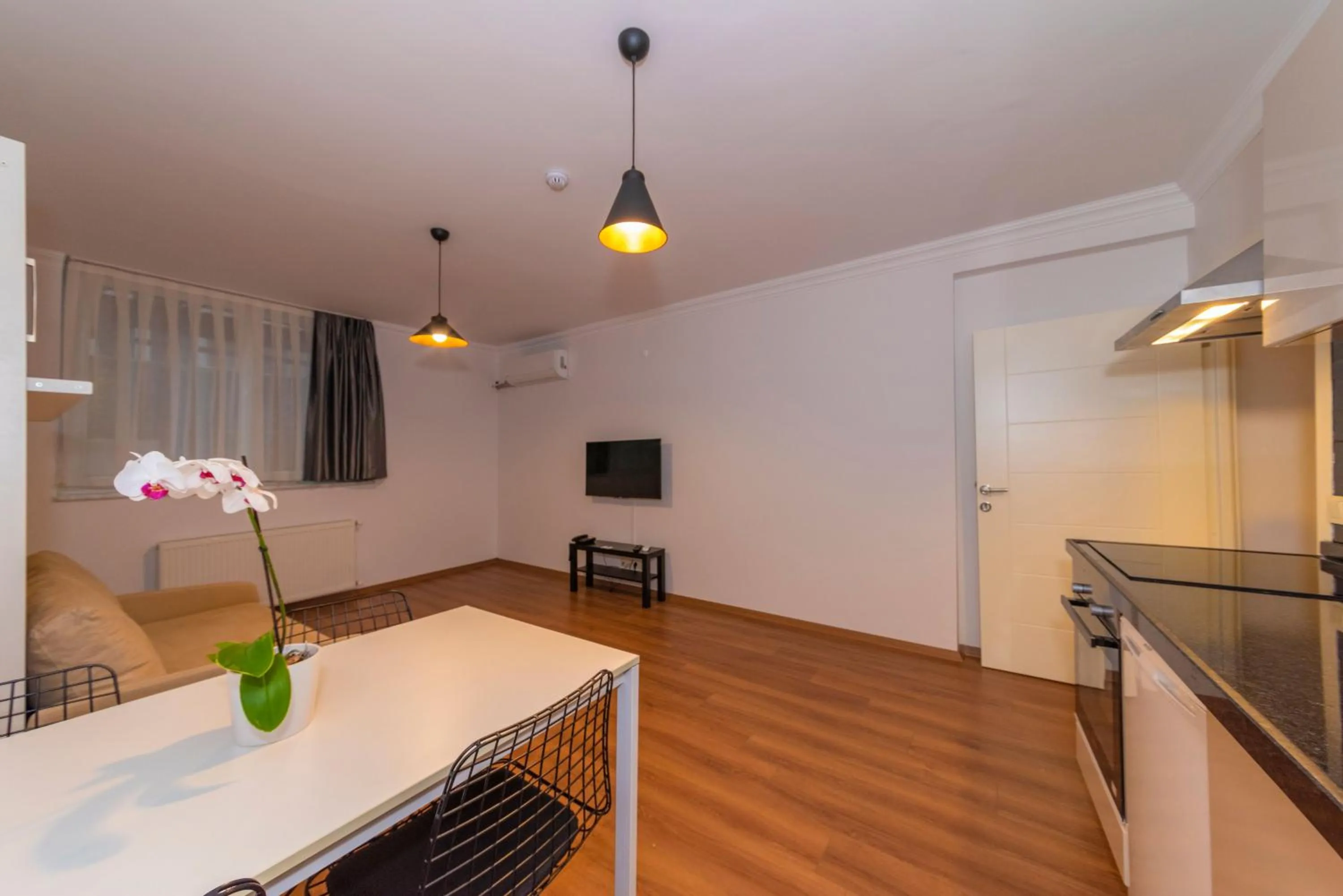 Kitchen or kitchenette in Joy Suites