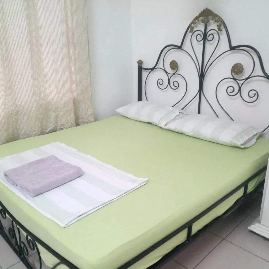 Bed in Apartment in Dar Homestay