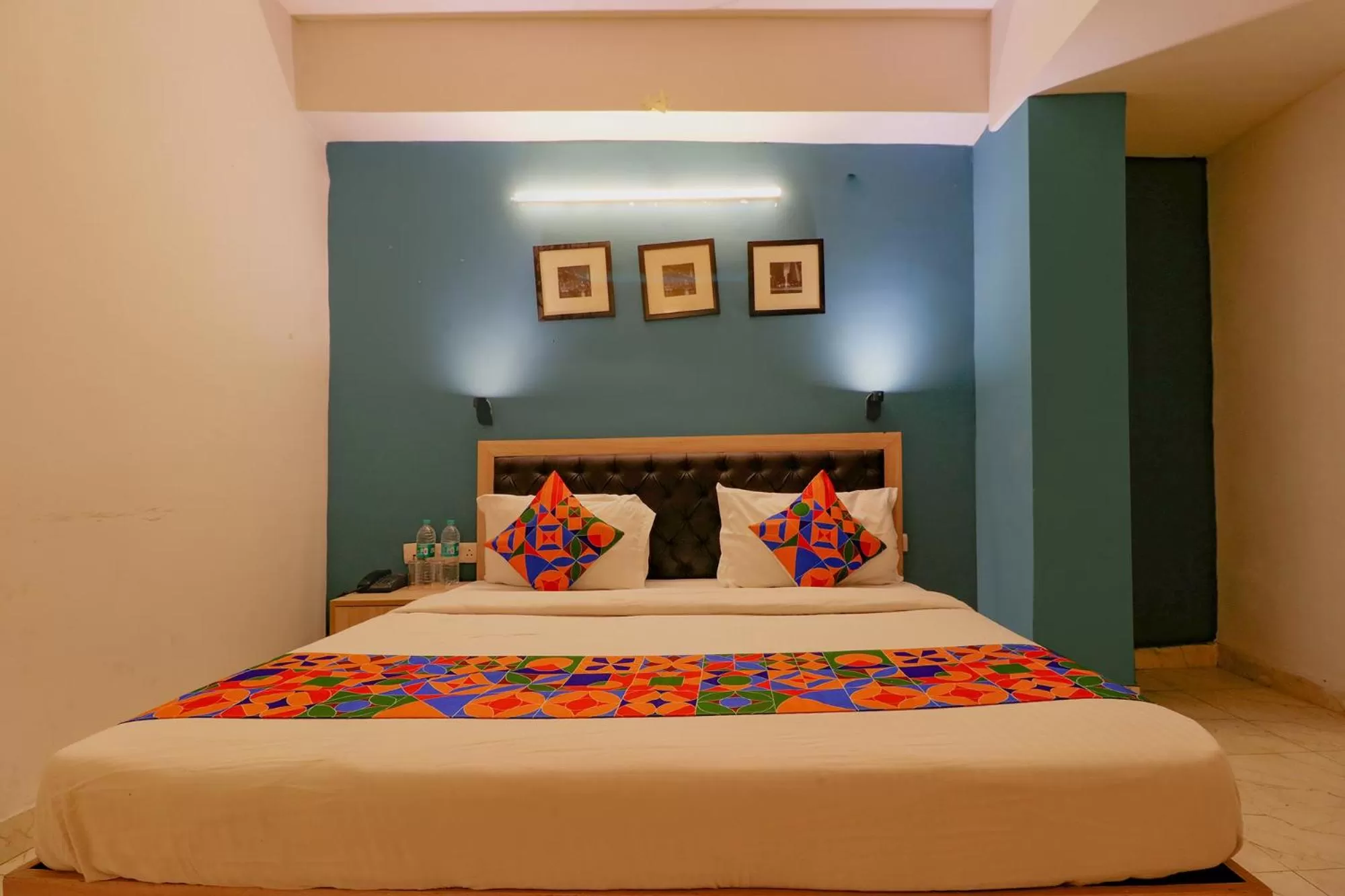 Bed in FabHotel Happy Inn