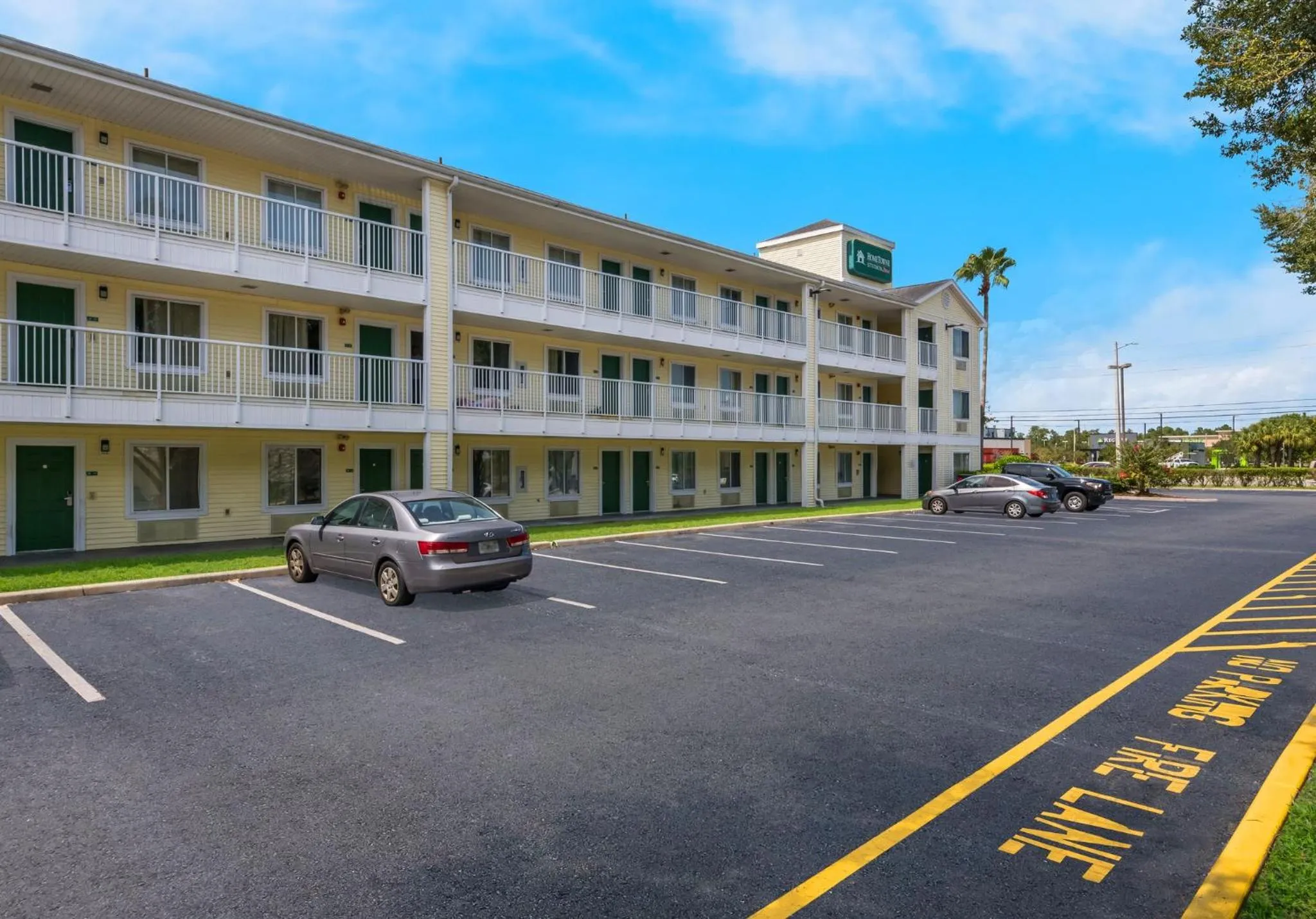 Property building in HomeTowne Studios by Red Roof Orlando - UCF Area